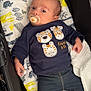Rafael a rejoint le concours — aidez-le/la à gagner de superbes lots ! baby, infant, pacifier, clothing, jeans, sock, blanket, stroller, animal_print, pattern, cute, child, laying, indoor, portrait, face, hand, footwear, expression, cozy