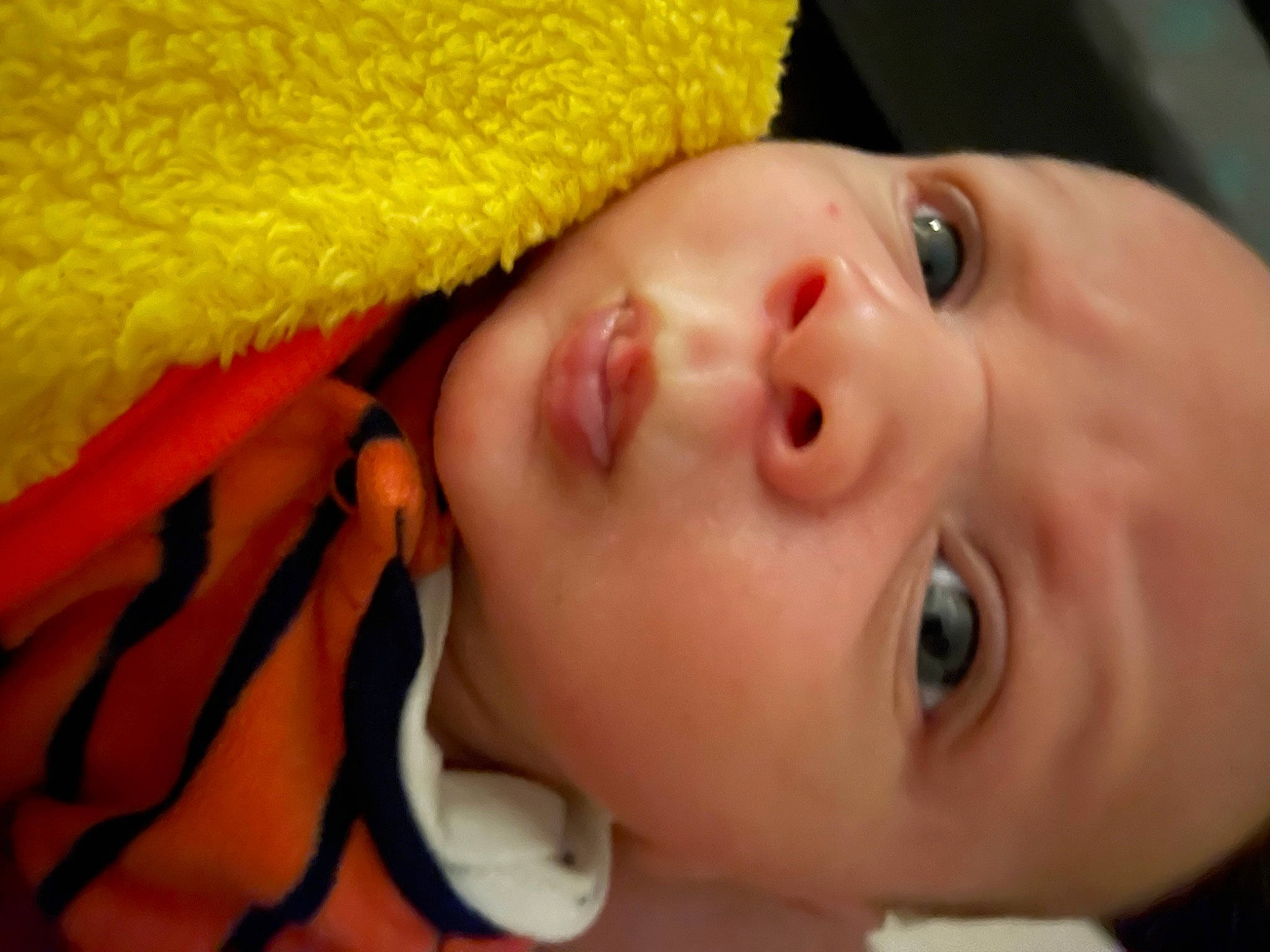 Caysen joined the competition — help win amazing prizes! baby, cheek, child, chin, clothing, comfort, eye, eyebrow, eyelash, fun, gesture, happy, head, iris, lip, mouth, nose, orange, person, skin