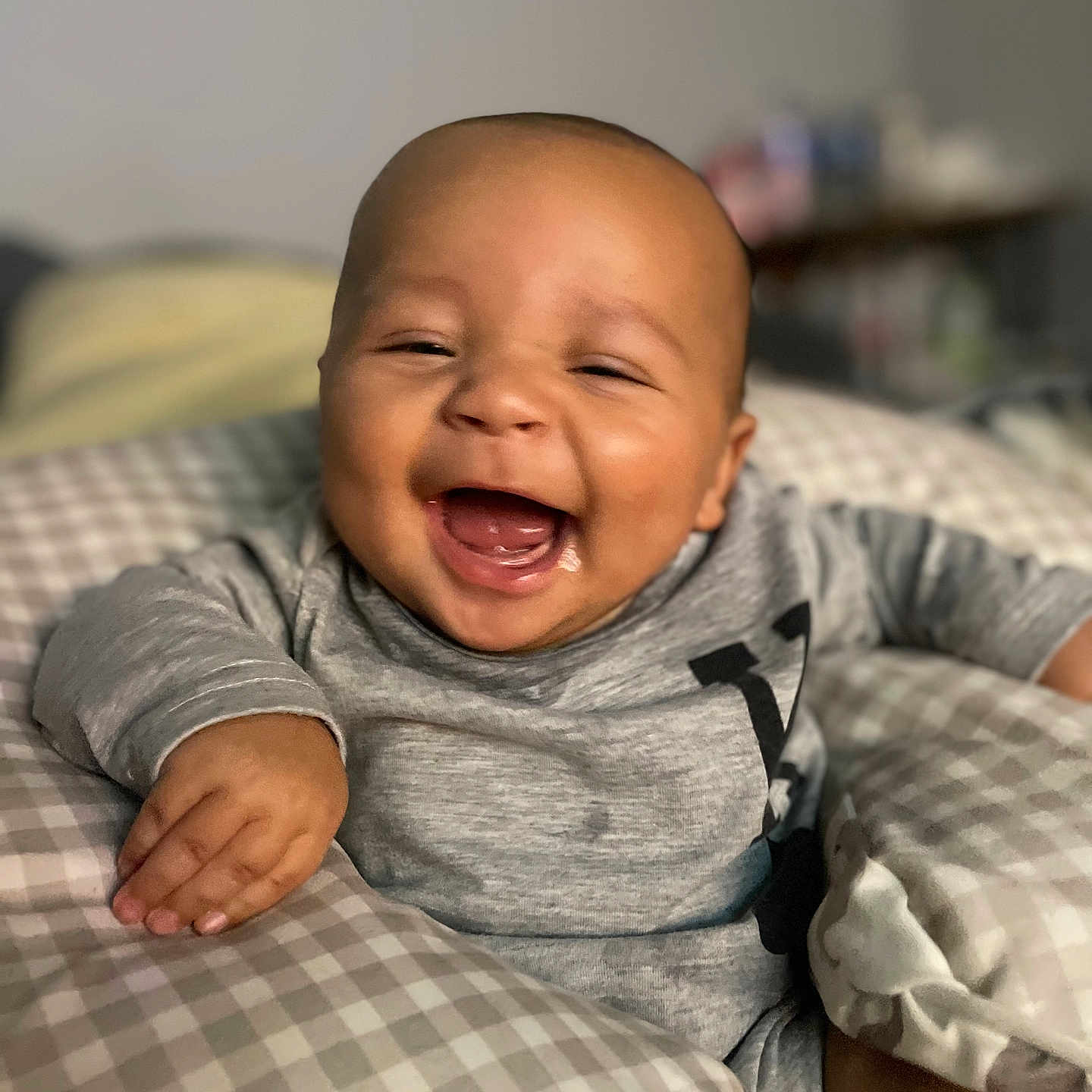 Damari is registered to the contest to win money with this photo: baby, babylaughing, face, happy, head, laughing, person, smile