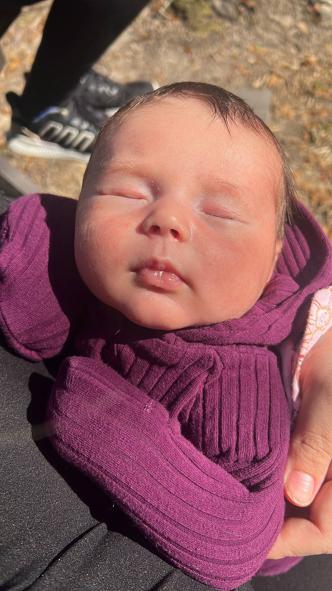 Sadie is registered to the contest to win money with this photo: baby, baby_toddler_clothing, cheek, chin, comfort, eye, eyebrow, eyelash, finger, grass, happy, head, iris, lip, mouth, neck, nose, person, pink, skin