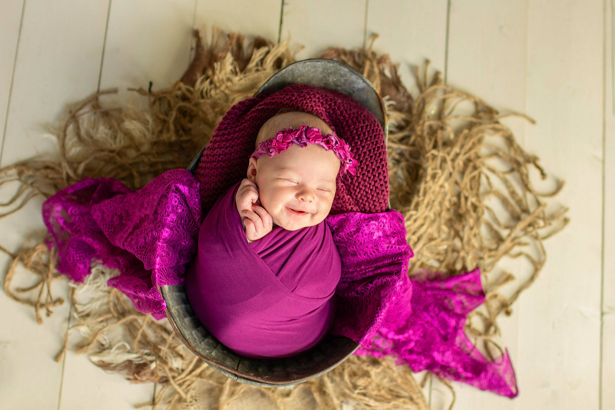 Ivy Jean is registered to the contest to win money with this photo: baby, baby_toddler_clothing, child, comfort, eye, fur, grass, happy, headgear, headwear, jacket, linens, magenta, person, pink, plant, purple, sleeve, smile, toddler