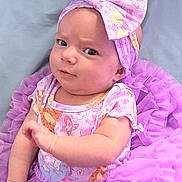 Sienna joined the competition — help win amazing prizes! baby, infant, child, portrait, sitting, pink, purple, tutu, dress, bow, headband, outfit, fashion, cute, looking_at_camera, indoors, blanket, fabric, baby_photography, colorful