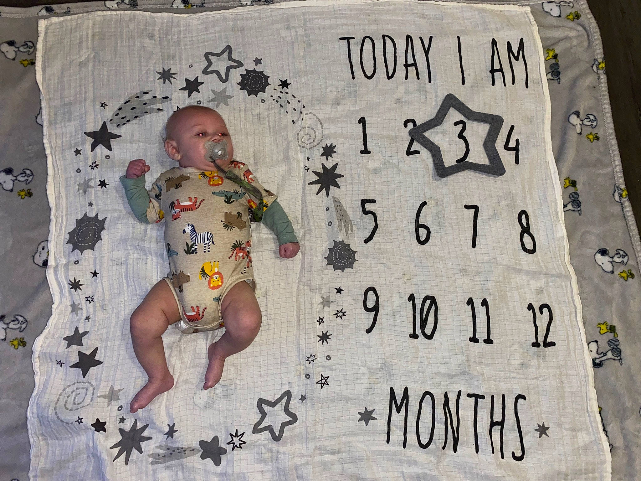 Malcolm is registered to the contest to win money with this photo: art, baby, baby_products, baby_toddler_clothing, bedding, child, drawing, facial_expression, font, happy, illustration, linens, mammal, pattern, person, product, sleeve, t_shirt, textile, toddler