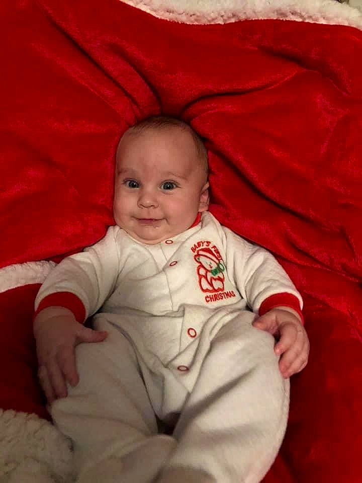 Jaxtyn is registered to the contest to win money with this photo: baby, baby_toddler_clothing, cheek, chin, comfort, eye, eyebrow, face, hairstyle, happy, head, iris, joy, lip, mouth, nose, person, pink, skin, sleeve