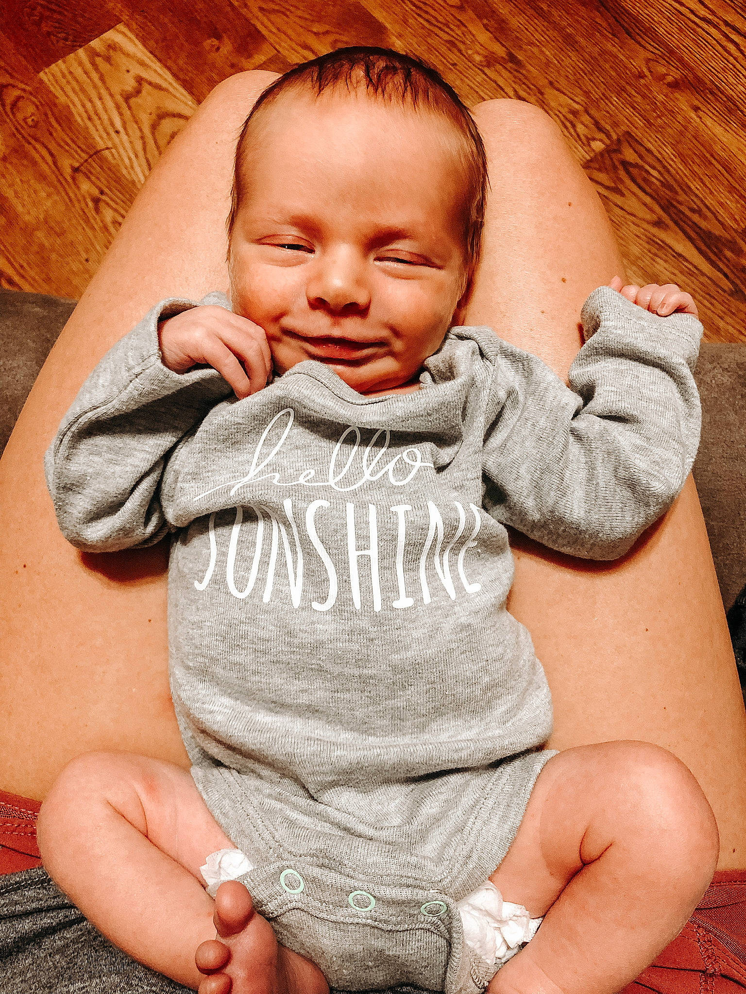 Bodie is registered to the contest to win money with this photo: arm, baby_toddler_clothing, cheek, chin, comfort, eye, face, hair, hairstyle, hand, head, human_body, joint, joy, lip, mouth, muscle, nose, person, skin