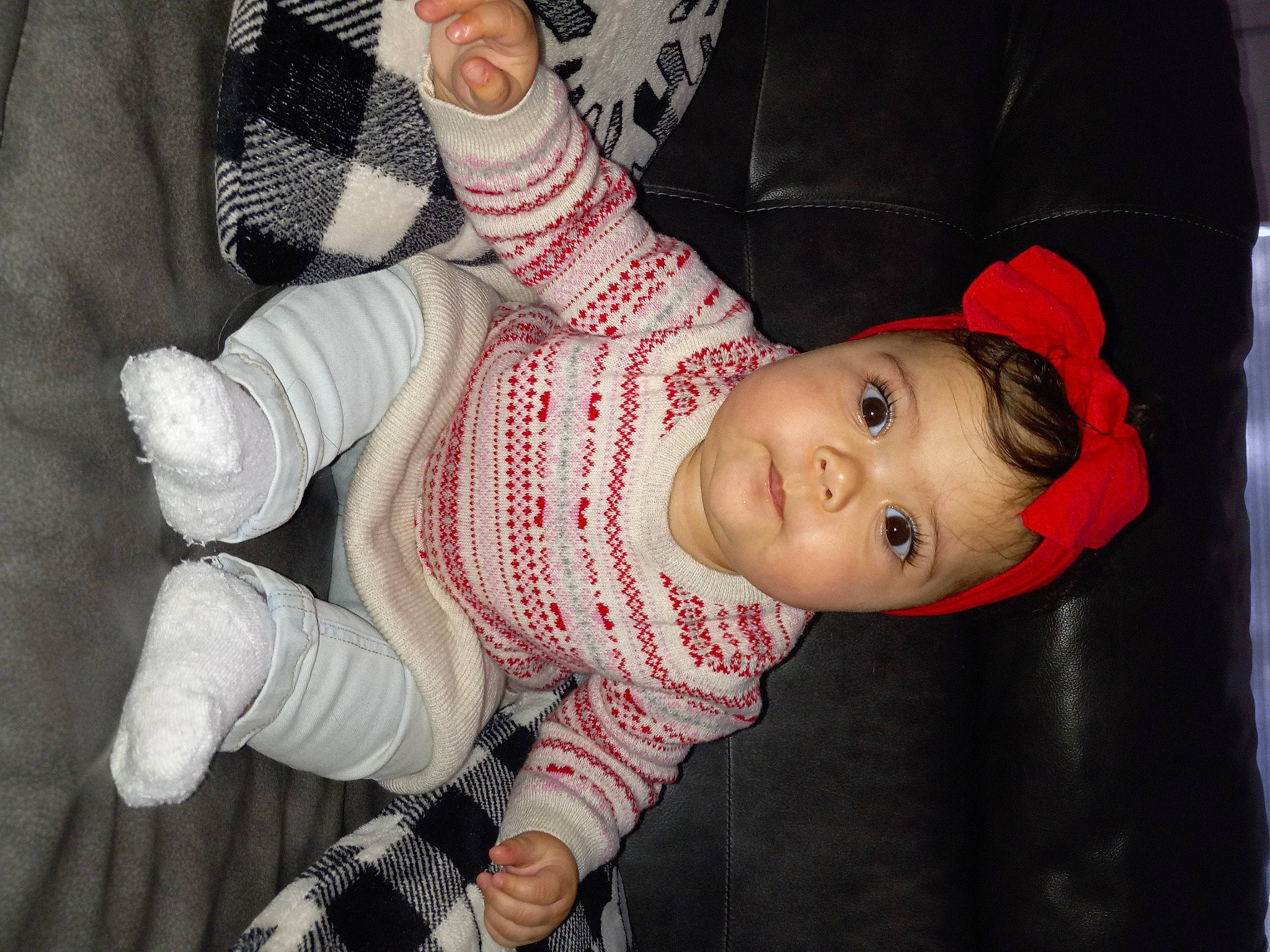 Novaleigh joined the competition — help win amazing prizes! baby, baby_toddler_clothing, cheek, child, comfort, finger, gesture, hat, human_body, human_leg, lip, mouth, nail, nose, pattern, person, skin, sleeve, smile, thumb