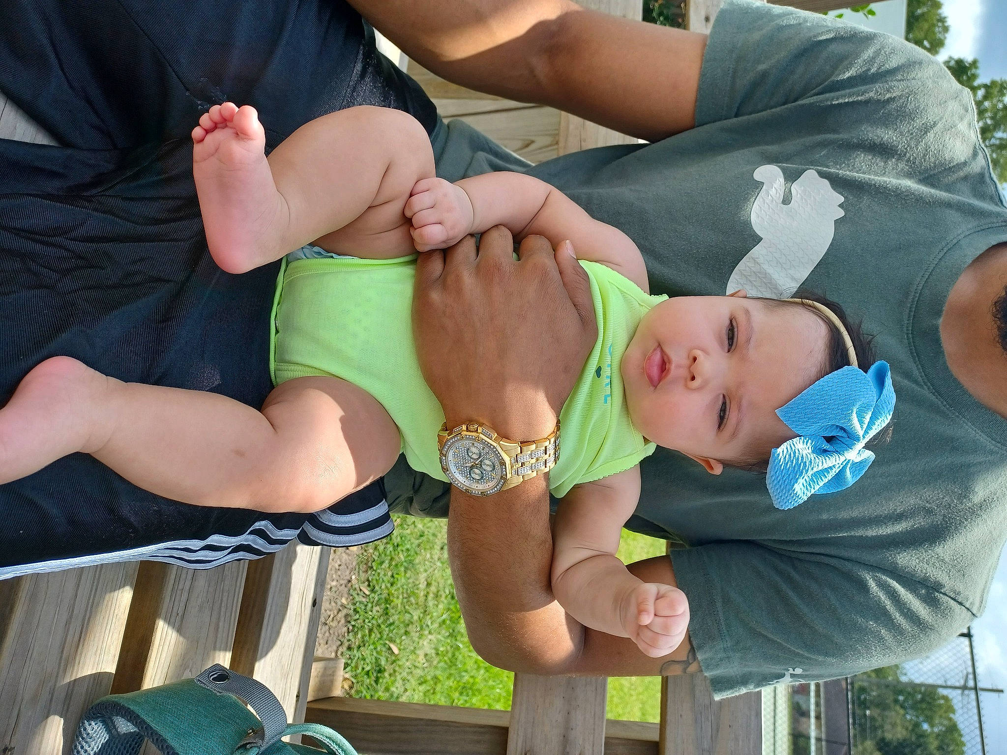 Novaleigh is registered to the contest to win money with this photo: child, clothing, elbow, finger, gesture, grass, green, hand, happy, hat, headwear, human_body, joint, knee, leisure, person, recreation, shorts, sun_hat, thigh