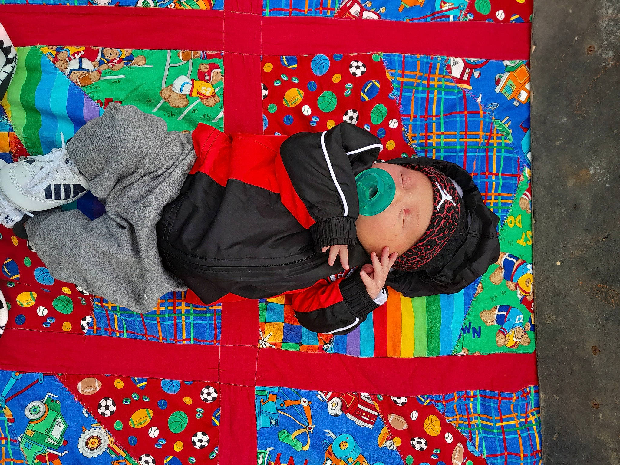 Jacob is registered to the contest to win money with this photo: art, carmine, child, craft, electric_blue, font, fun, graphic_design, happy, hat, headwear, linens, magenta, pattern, person, play, red, sleeve, sun_hat, sunglasses