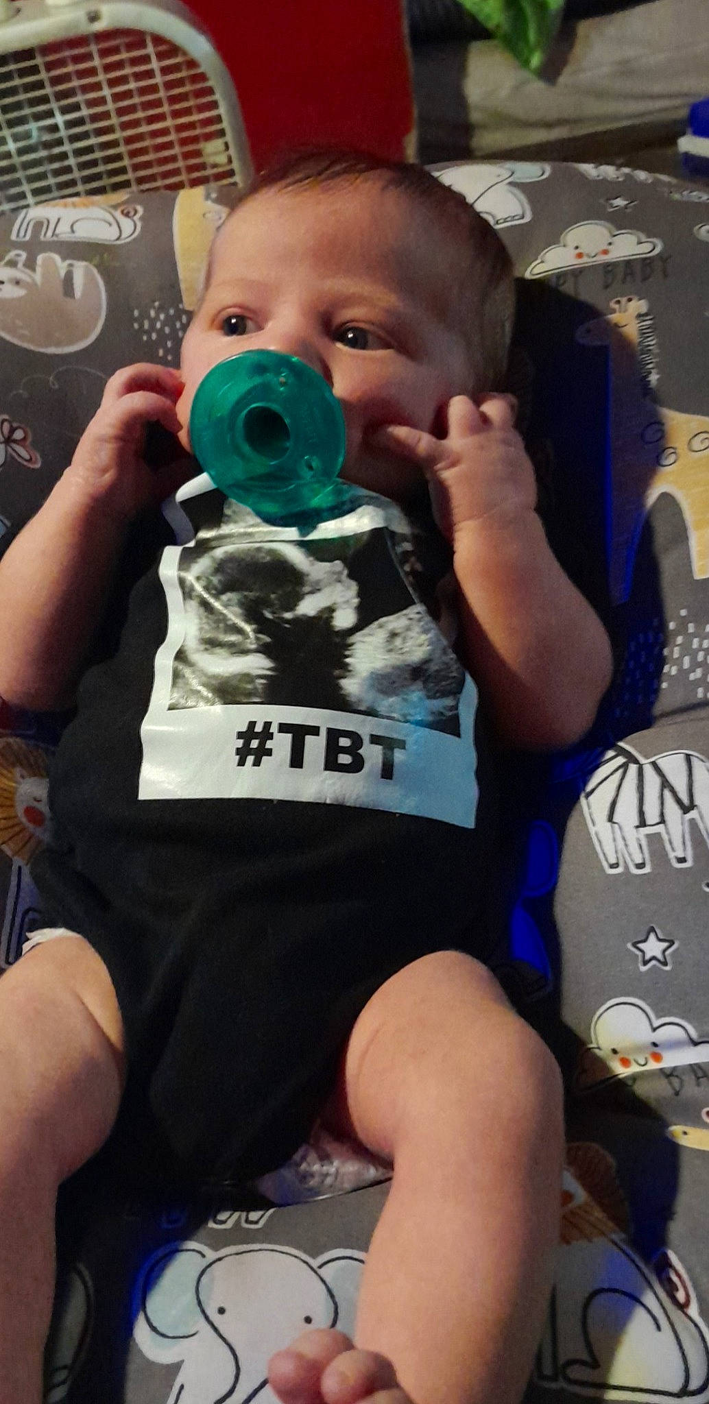 Jacob is registered to the contest to win money with this photo: baby, baby_toddler_clothing, cool, drinkware, facial_expression, finger, fun, green, hairstyle, happy, mouth, muscle, nail, person, personal_protective_equipment, photograph, product, sleeve, t_shirt, toddler