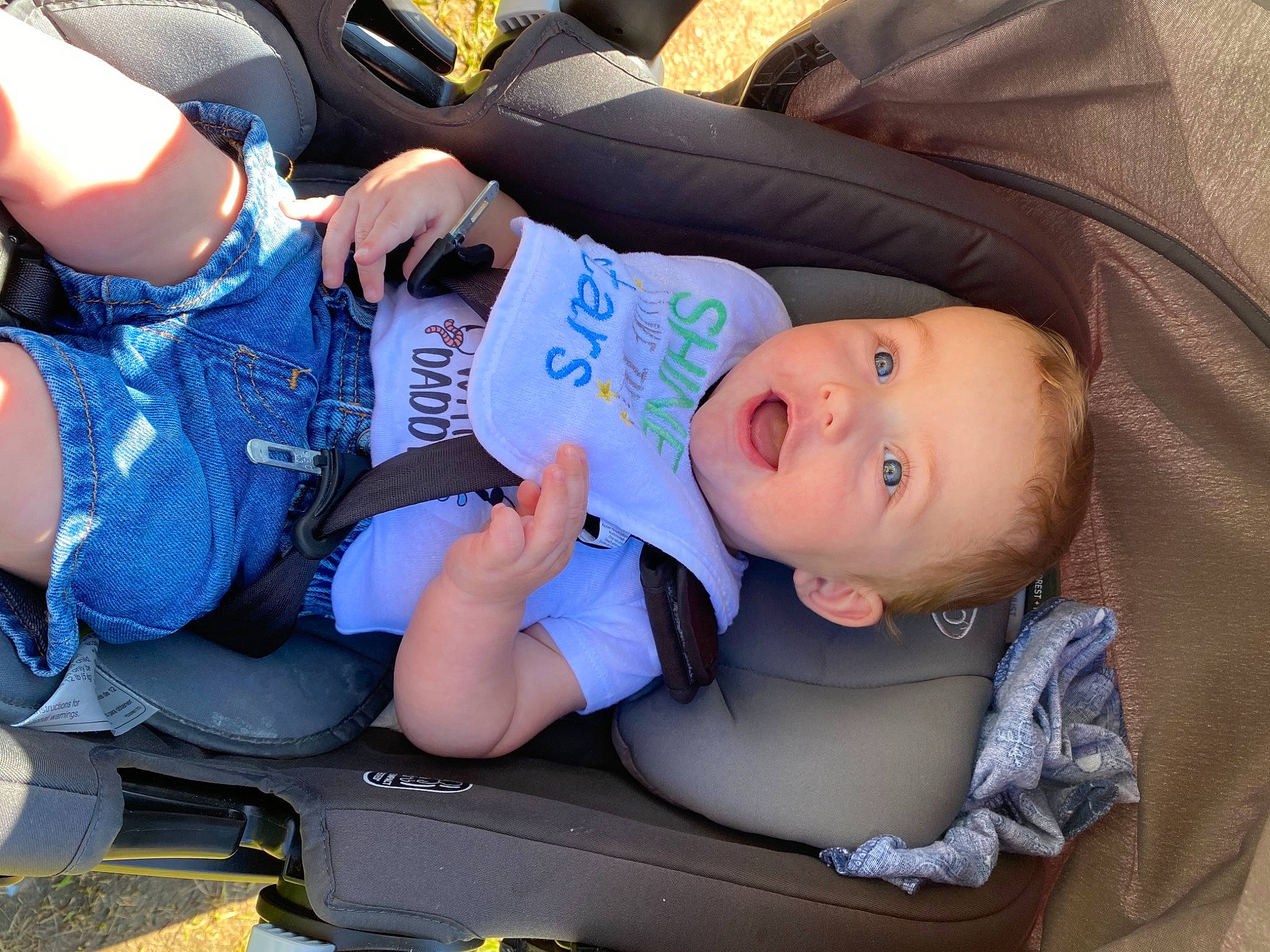 Elias is registered to the contest to win money with this photo: auto_part, baby, baby_carriage, baby_in_car_seat, baby_products, baby_toddler_clothing, car_seat, child, comfort, electric_blue, family_car, fun, hat, lap, motor_vehicle, person, product, sitting, thigh, toddler