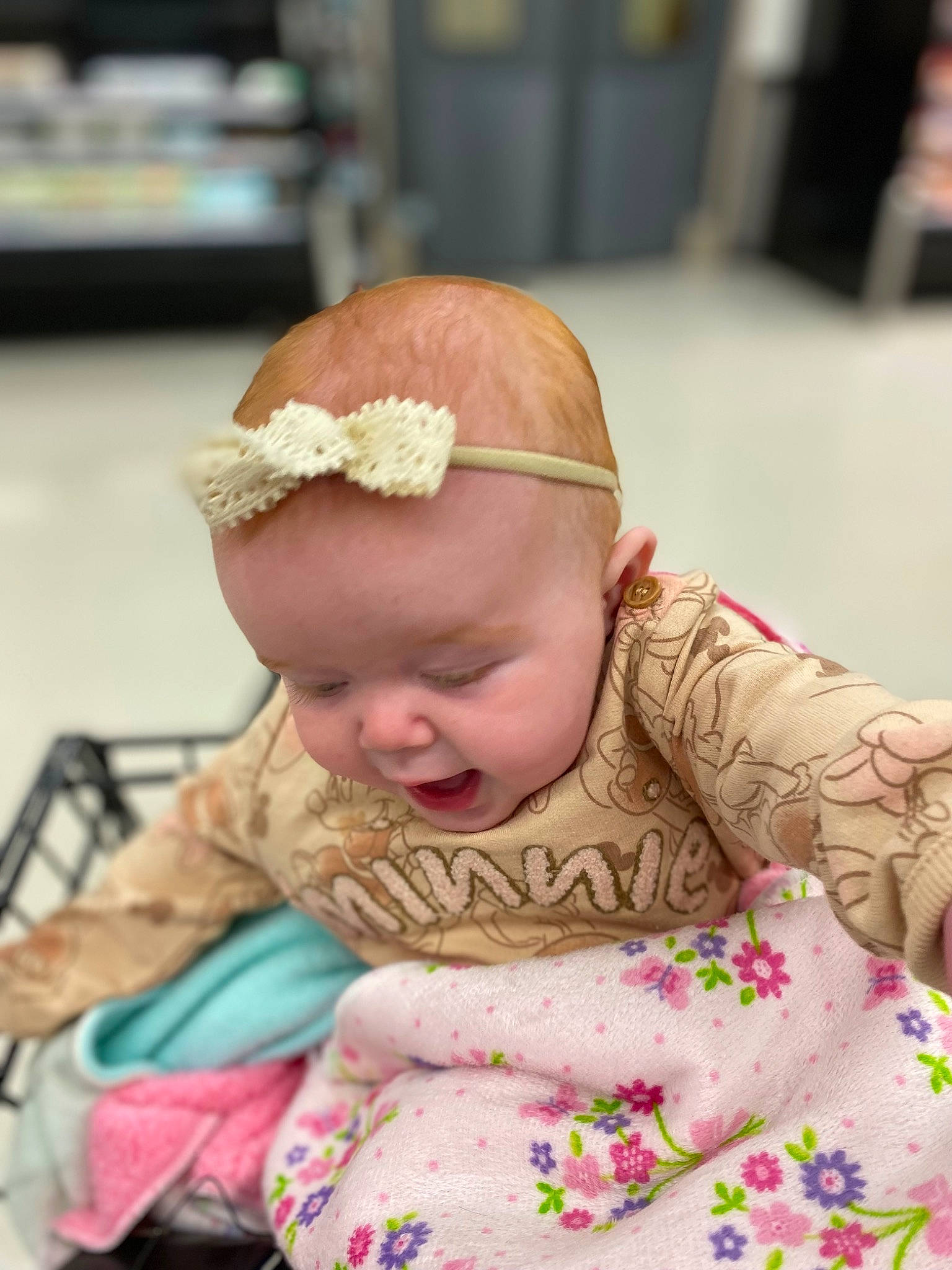 Alora is registered to the contest to win money with this photo: baby, baby_products, baby_toddler_clothing, cap, chair, cheek, child, event, eye, fashion_accessory, happy, headband, headpiece, iris, jewellery, pattern, peach, person, sitting, sleeve