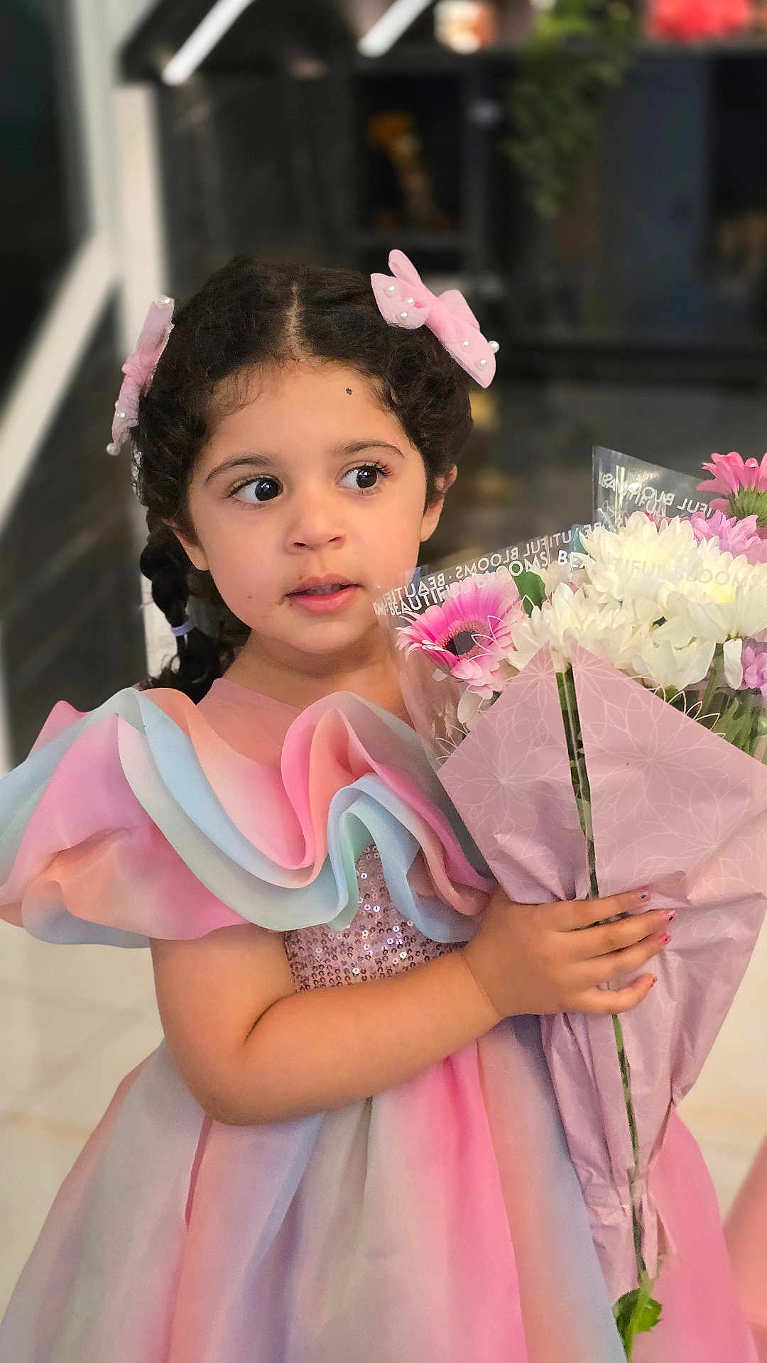 Evelina is registered to the contest to win money with this photo: child, girl, flower_bouquet, pastel_colors, dress, ruffles, braided_hair, pink_bow, indoor, portrait, cute, curious, holding, flowers, celebration, smiling, young, pretty, fashion, happy