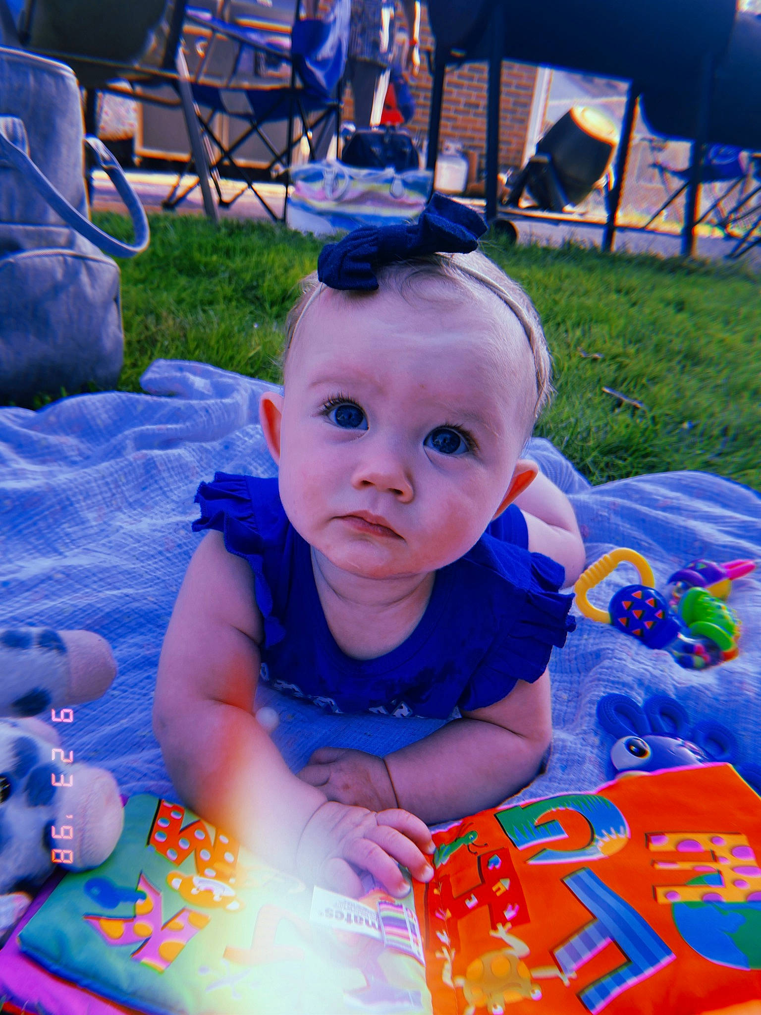 Jupiter joined the competition — help win amazing prizes! baby, baby_toddler_clothing, blue, chair, child, electric_blue, event, fun, grass, green, happy, leisure, light, person, photograph, plant, purple, recreation, sitting, snapshot