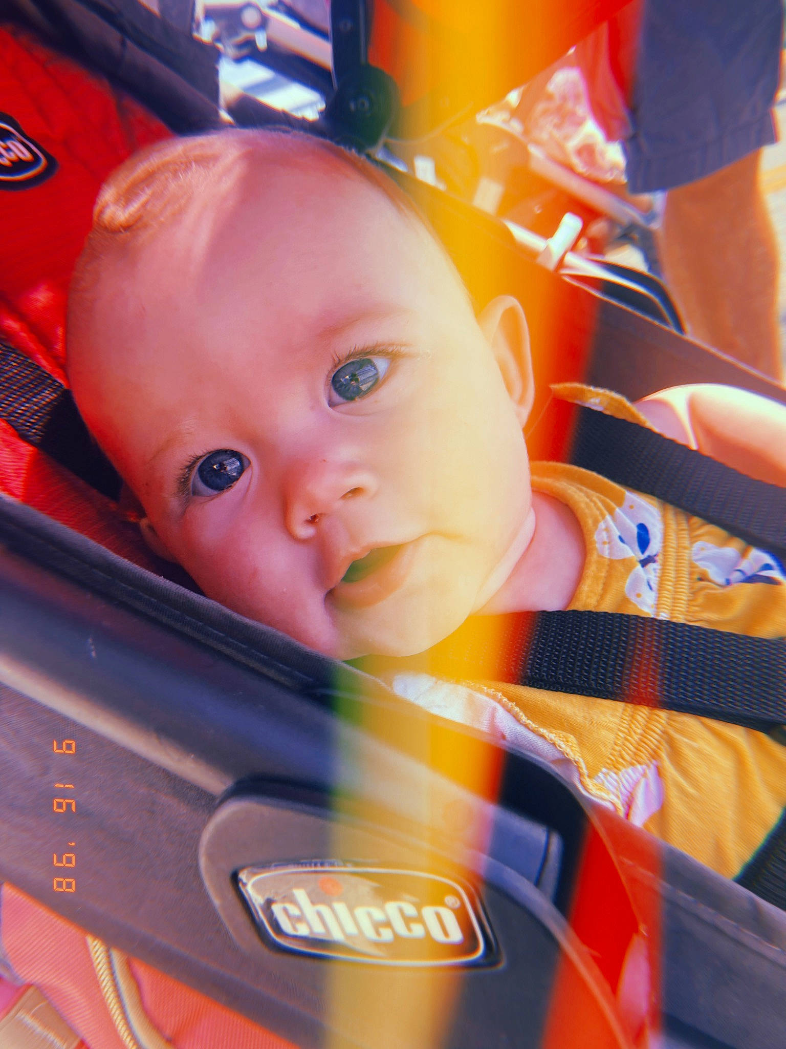 Jupiter is registered to the contest to win money with this photo: baby, baby_carriage, baby_products, baby_safety, baby_toddler_clothing, carmine, cheek, child, chin, electric_blue, fun, happy, orange, person, personal_protective_equipment, sitting, toddler