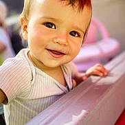 Luis participe au concours pour gagner de l'argent avec cette photo : toddler, child, smiling, face, portrait, outdoor, sunlight, happy, person, baby, cute, clothing, hand, head, skin, young, cheerful, closeup, background_blur, daylight