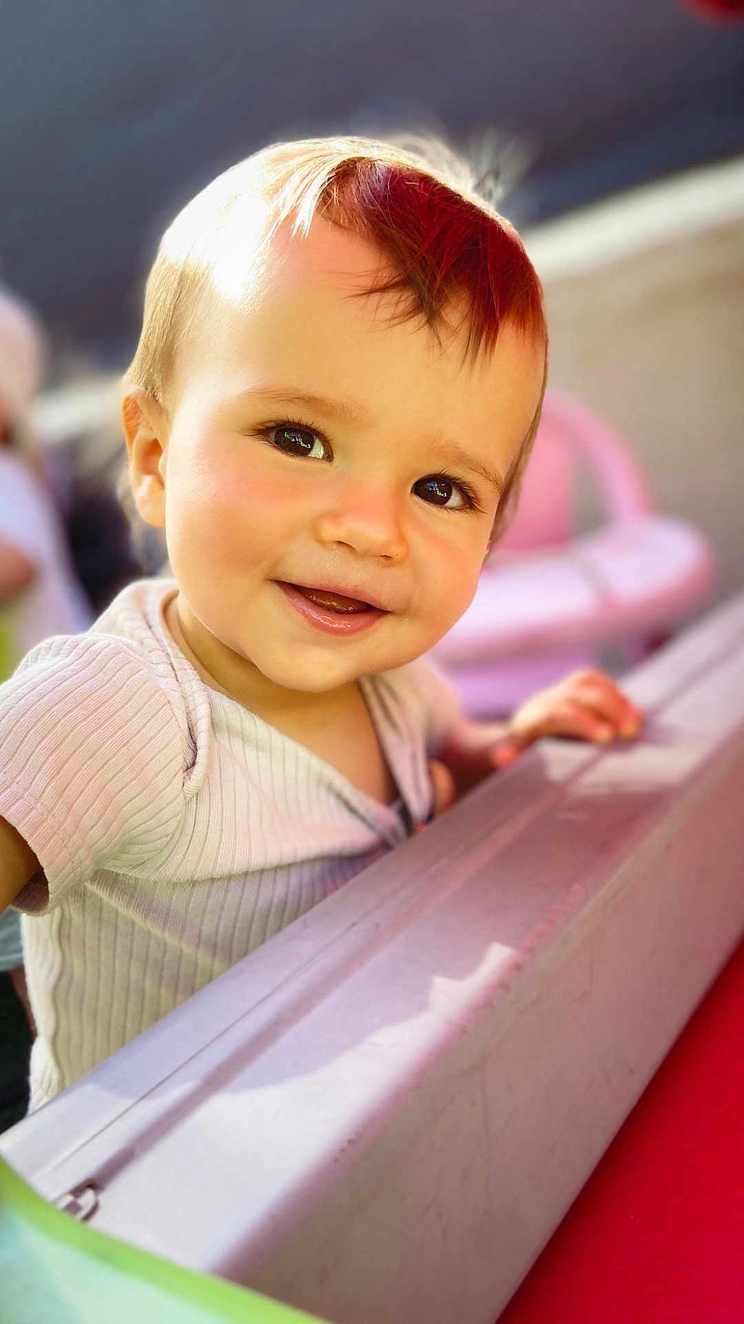 Luis participe au concours pour gagner de l'argent avec cette photo : toddler, child, smiling, face, portrait, outdoor, sunlight, happy, person, baby, cute, clothing, hand, head, skin, young, cheerful, closeup, background_blur, daylight