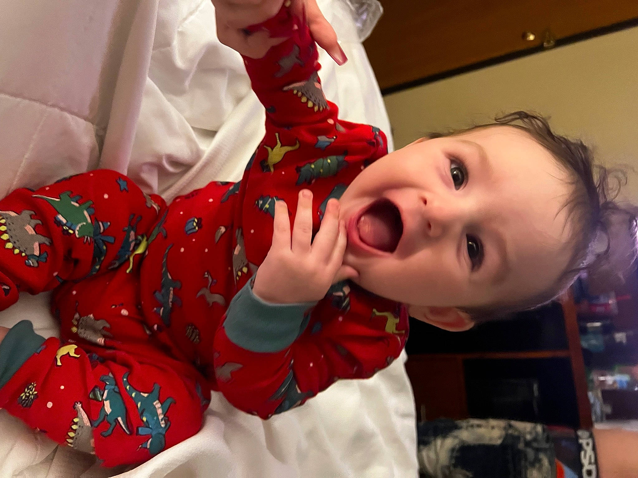 Ace joined the competition — help win amazing prizes! baby, baby_toddler_clothing, carmine, cheek, child, christmas, christmas_eve, event, happy, holiday, nightwear, pajamas, pattern, person, red, room, skin, sleeve, smile, surprise