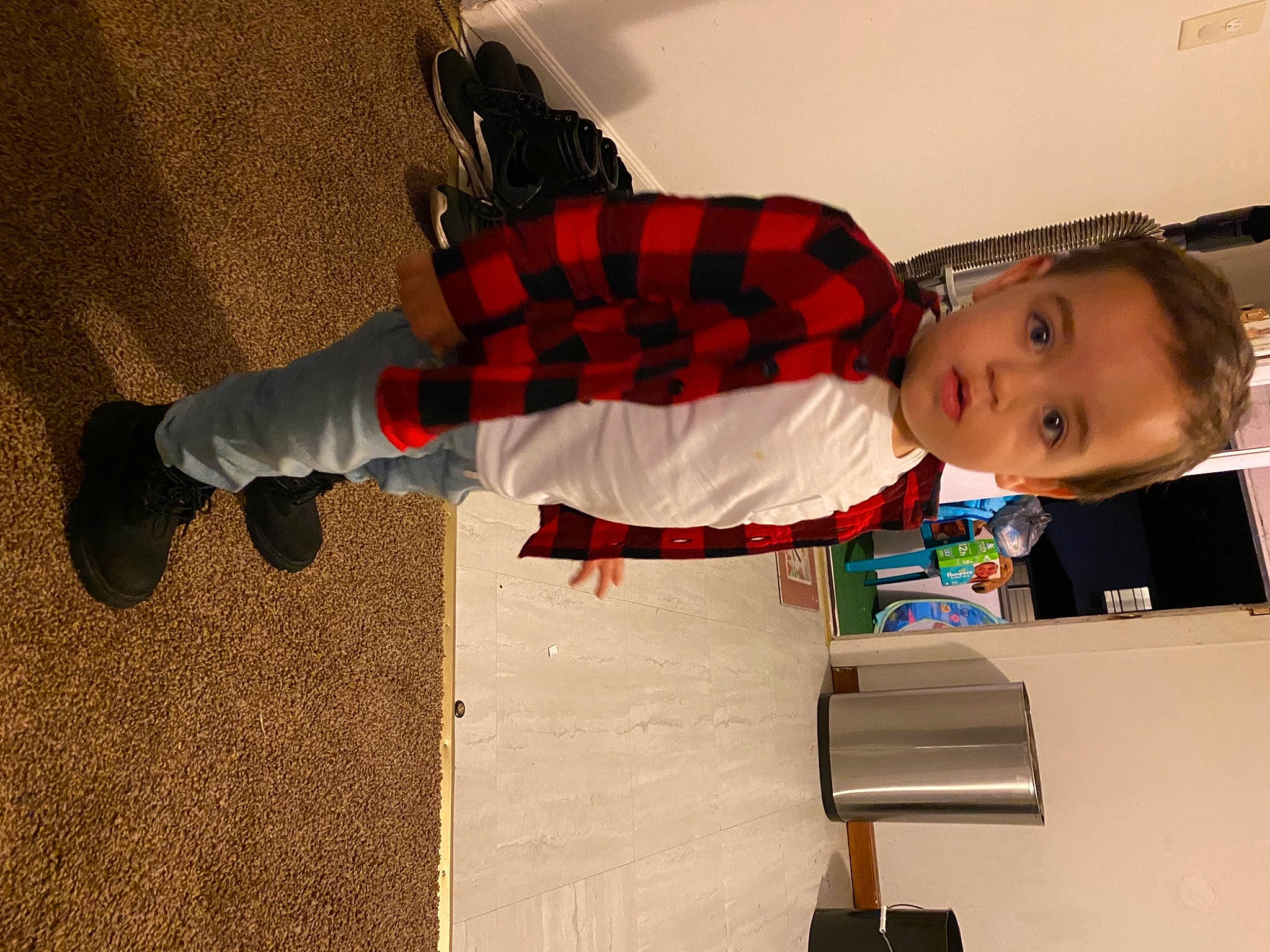 Brecken is registered to the contest to win money with this photo: baby, baby_toddler_clothing, box, child, person, plaid, sock, tartan, toddler, walking_shoe