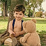Aleks joined the competition — help win amazing prizes! child, toddler, teddy_bear, grass, tree, boot, book, outdoor, park, nature, smiling, sitting, toy, cute, sunlight, daytime, young, playful, bare_chest, casual