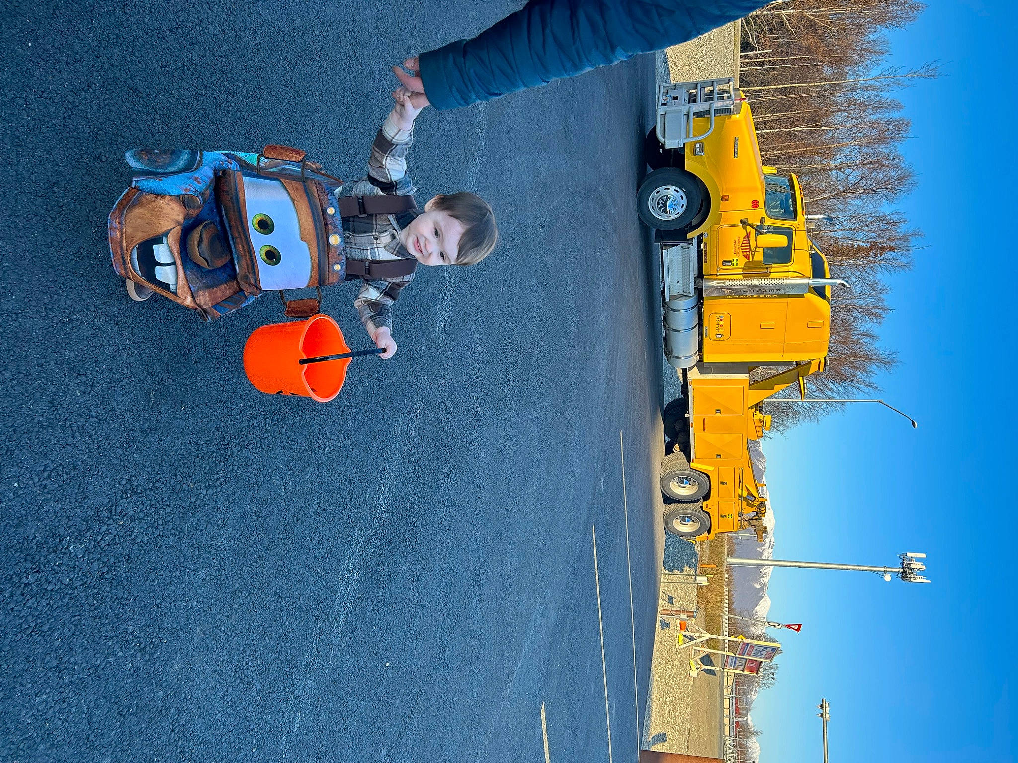 Gary is registered to the contest to win money with this photo: asphalt, azure, blue, boat, electric_blue, extreme_sport, font, fun, leisure, naval_architecture, person, recreation, reflection, sky, space, t_shirt, toddler, water, watercraft, world