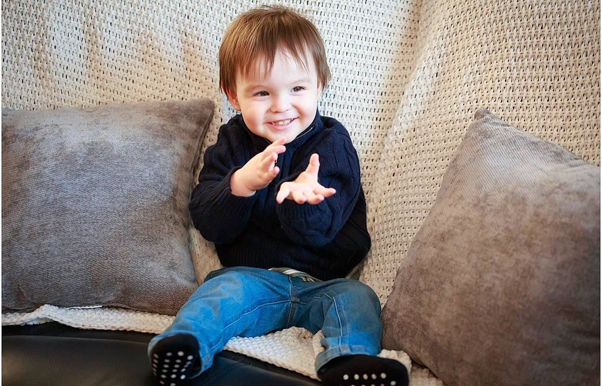 Gary joined the competition — help win amazing prizes! cheek, child, comfort, couch, denim, electric_blue, eye, flash_photography, flooring, fun, happy, iris, jeans, joy, leg, person, portrait_photography, sitting, skin, smile