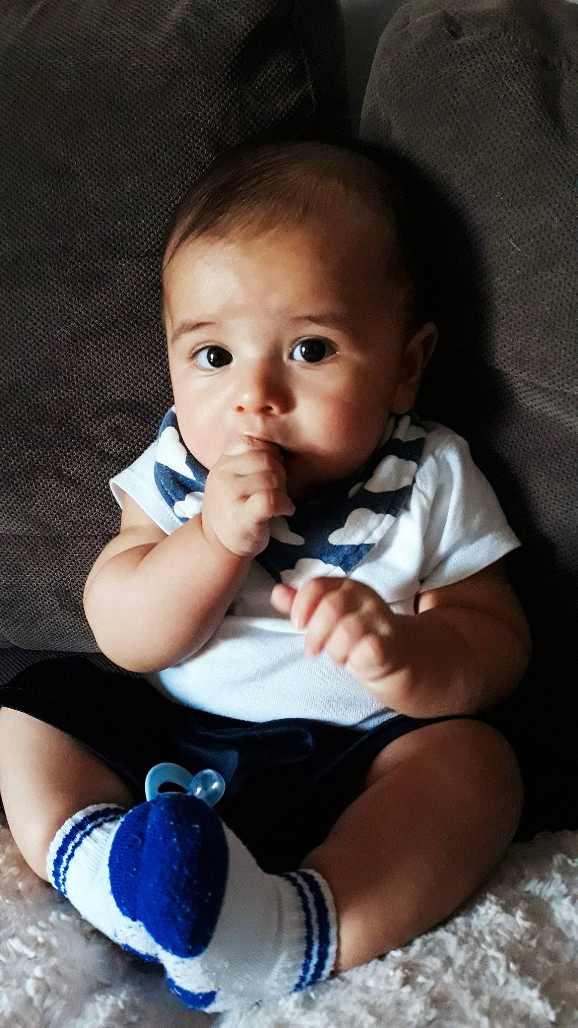 Jaime is registered to the contest to win money with this photo: baby, baby_products, cheek, child, eye, face, finger, hand, head, leg, mouth, nose, person, product, sitting, skin, smile, toddler