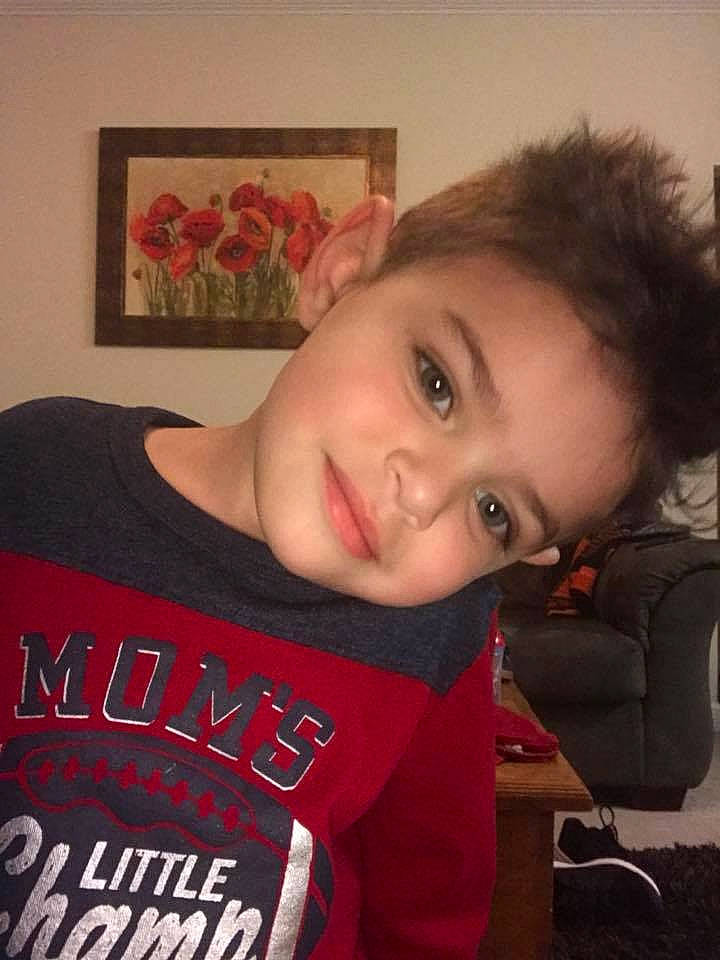 Landen is registered to the contest to win money with this photo: arm, black_hair, brown_hair, cheek, chin, cool, ear, eye, eyebrow, forehead, girl, hairstyle, head, human_hair_color, lip, mouth, neck, nose, person, product