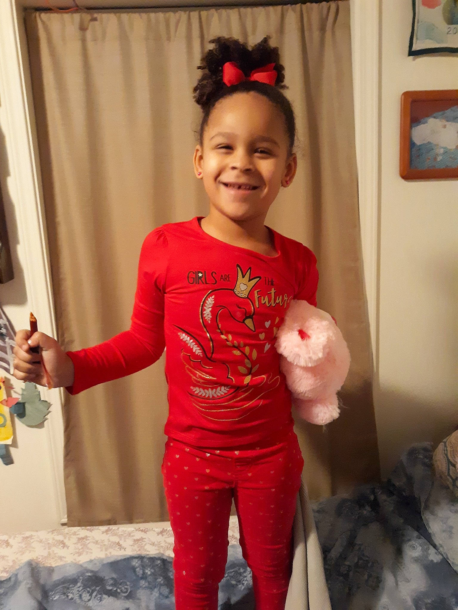 Skylah is registered to the contest to win money with this photo: abdomen, arm, child, costume, joy, person, red, sleeve, smile, standing, textile, toddler, trunk