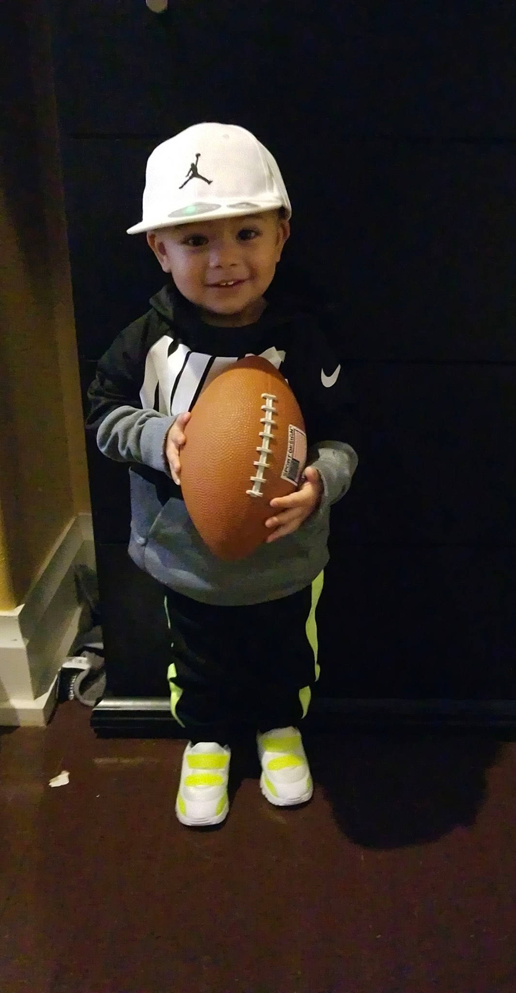 Josue joined the competition — help win amazing prizes! ball, baseball, baseball_glove, child, fashion_accessory, glove, headwear, helmet, joy, person, personal_protective_equipment, player, sports_equipment, sports_gear, sportswear, toddler