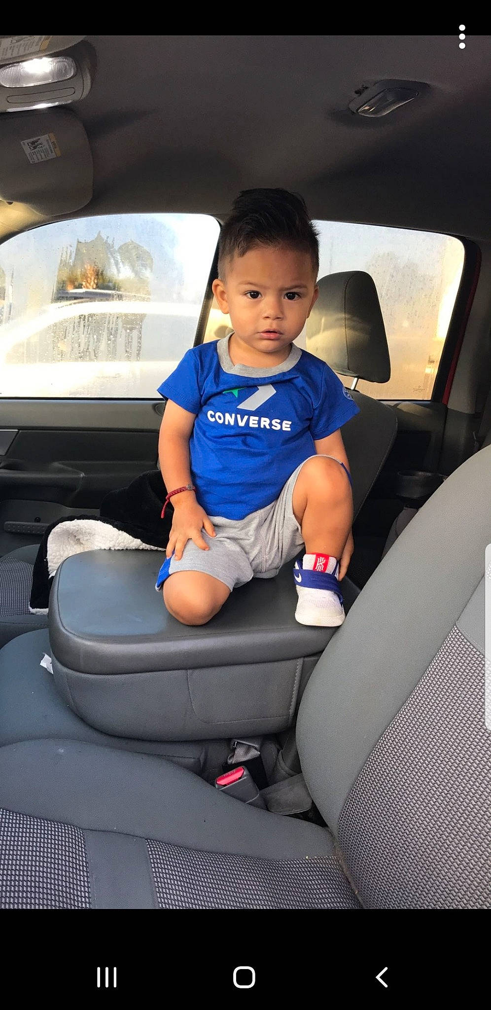Josue joined the competition — help win amazing prizes! armrest, auto_part, baby_in_car_seat, car, car_seat, car_seat_cover, child, family_car, head_restraint, person, seat_belt, toddler, vehicle