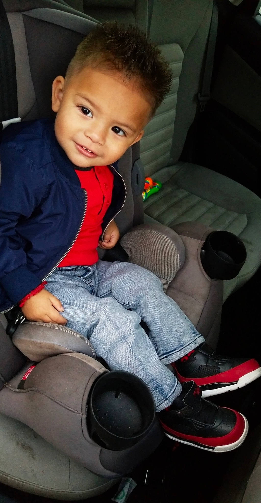Josue joined the competition — help win amazing prizes! auto_part, baby_in_car_seat, car_seat, child, person, sitting, toddler
