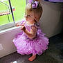 child, toddler, dress, purple, bow, window, carpet, barefoot, indoor, girl, standing, curtain, light, sunlight, looking_out, floor, person, cute, decor, toy