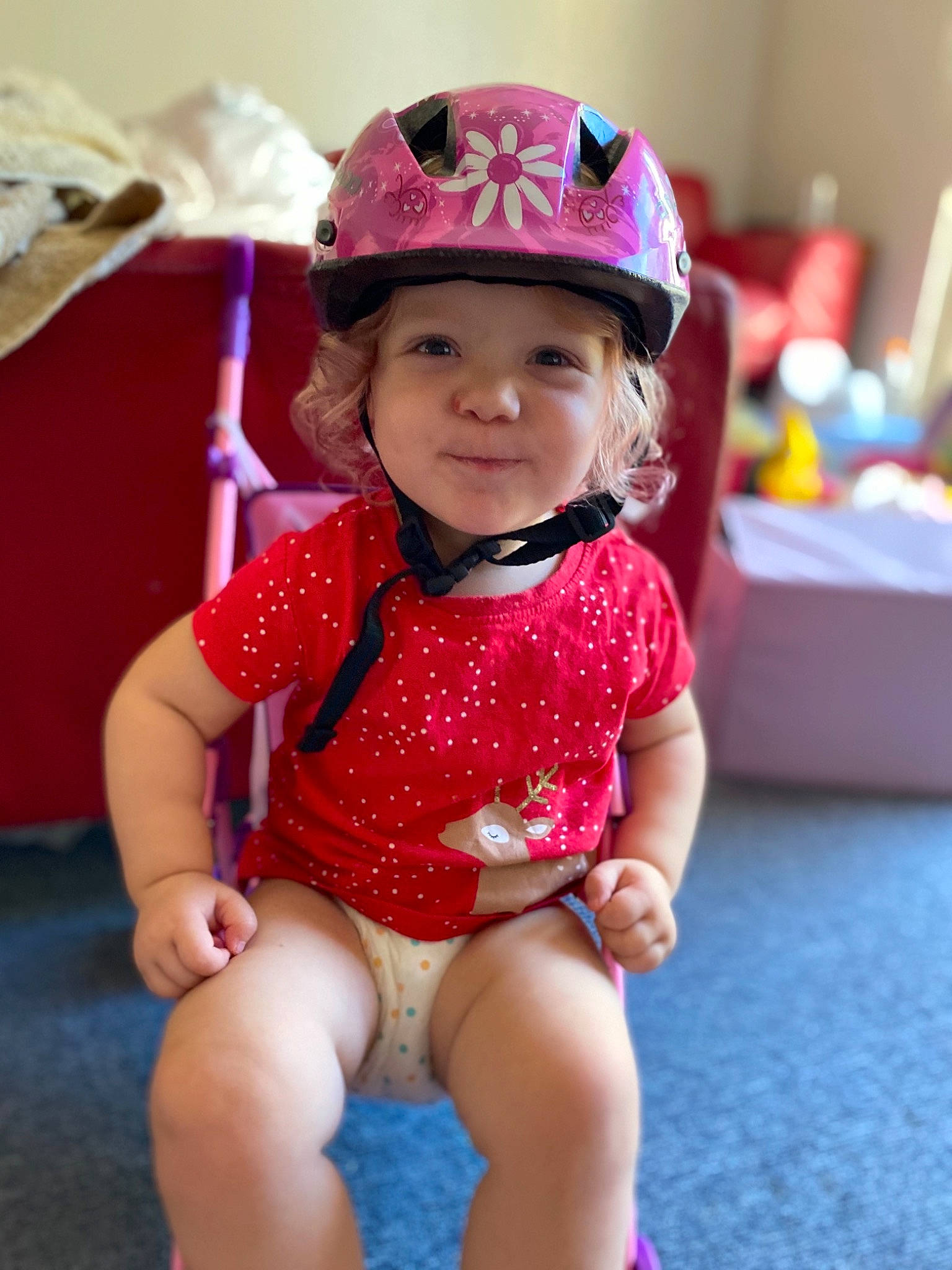 Amity joined the competition — help win amazing prizes! baby, baby_toddler_clothing, cap, cheek, child, fashion_accessory, fun, hat, headgear, headwear, helmet, leg, person, personal_protective_equipment, pink, play, red, skin, smile, toddler