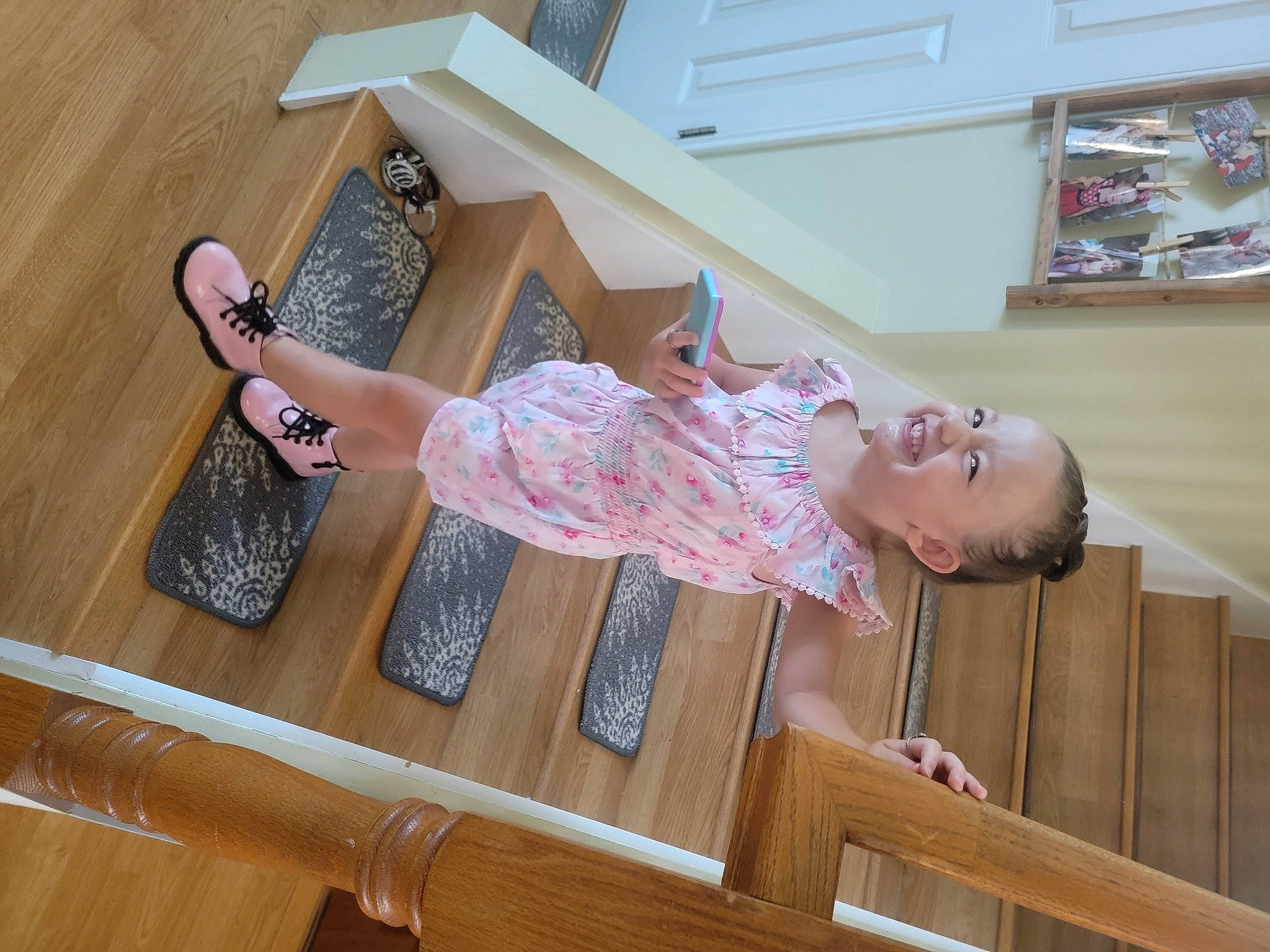 Adyson is registered to the contest to win money with this photo: baby_toddler_clothing, finger, floor, flooring, foot, fun, hardwood, human_body, human_leg, joint, joy, knee, pattern, person, room, sandal, sock, thigh, varnish, wood