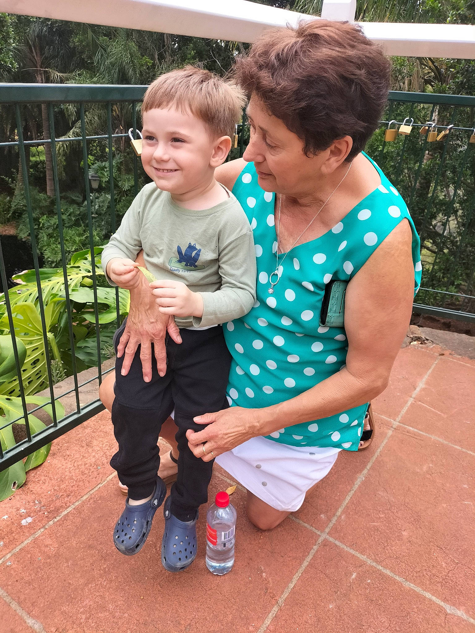 Izaiah joined the competition — help win amazing prizes! baby_toddler_clothing, child, event, fun, grass, happy, joy, leg, leisure, pattern, person, plant, play, recreation, sandal, sitting, smile, t_shirt, thigh, toddler