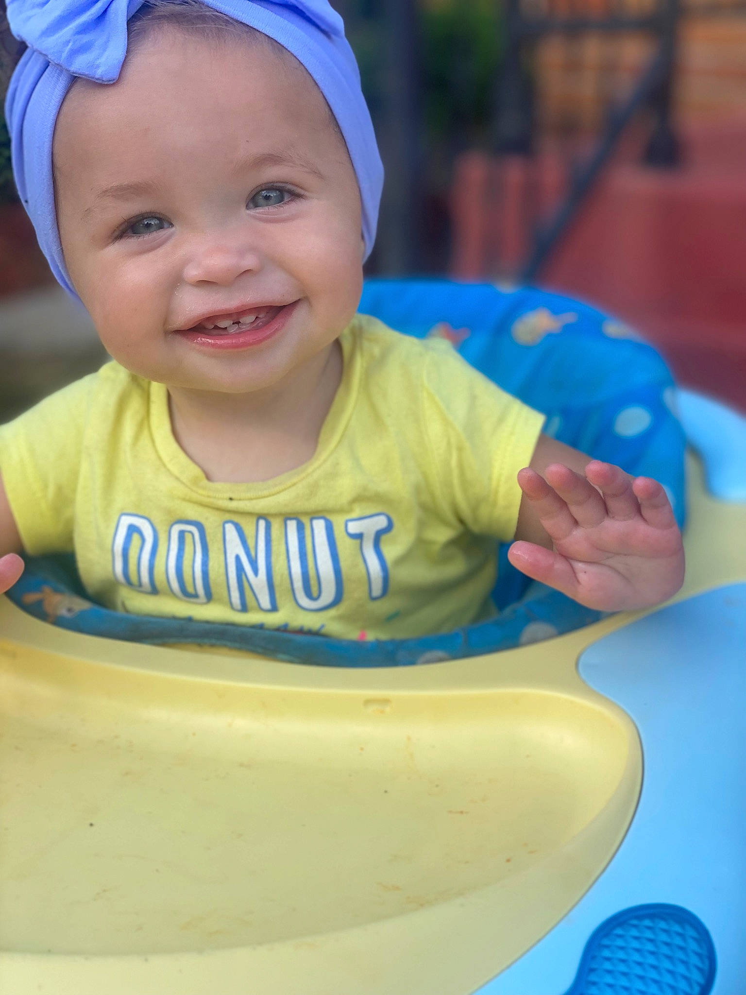Della is registered to the contest to win money with this photo: baby, baby_toddler_clothing, blue, cap, eye, face, facial_expression, finger, fun, happy, head, headwear, human_body, joy, leisure, person, product, skin, sleeve, smile