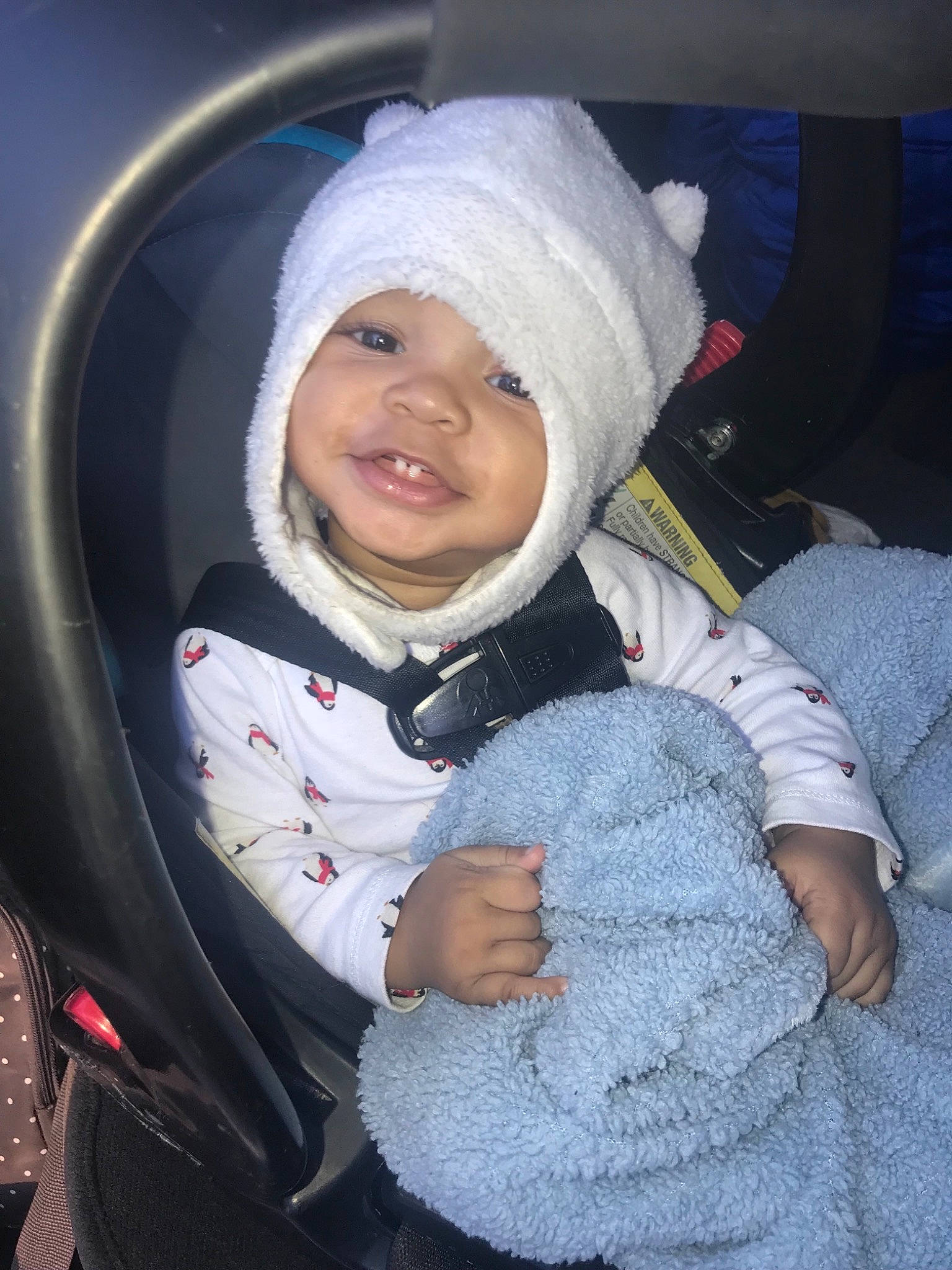 Zamauris is registered to the contest to win money with this photo: baby, baby_carriage, baby_products, bonnet, car_seat, cheek, child, eye, fun, person, product, skin, smile, snow, toddler, winter