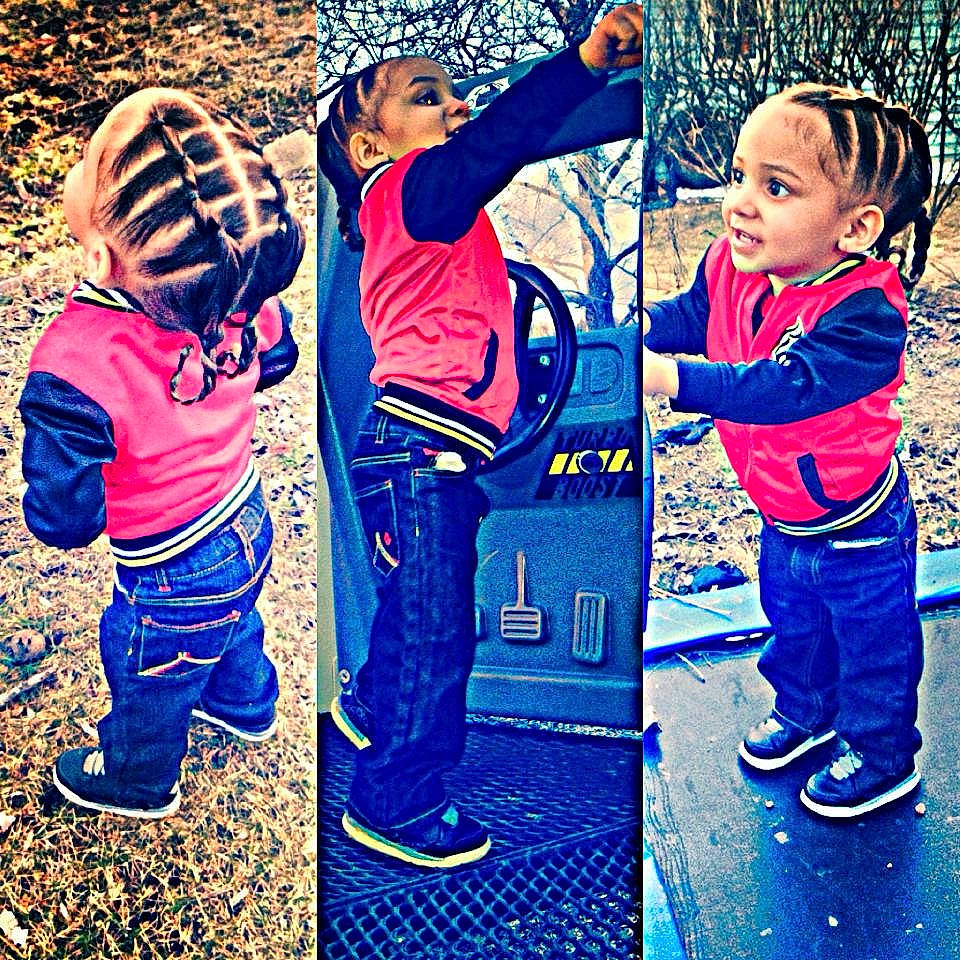 Jamarion is registered to the contest to win money with this photo: child, fun, gesture, happy, jacket, jeans, male, outdoor_play_equipment, outerwear, people, person, play, playground, public_space, recreation, sky, smile, toddler, tree