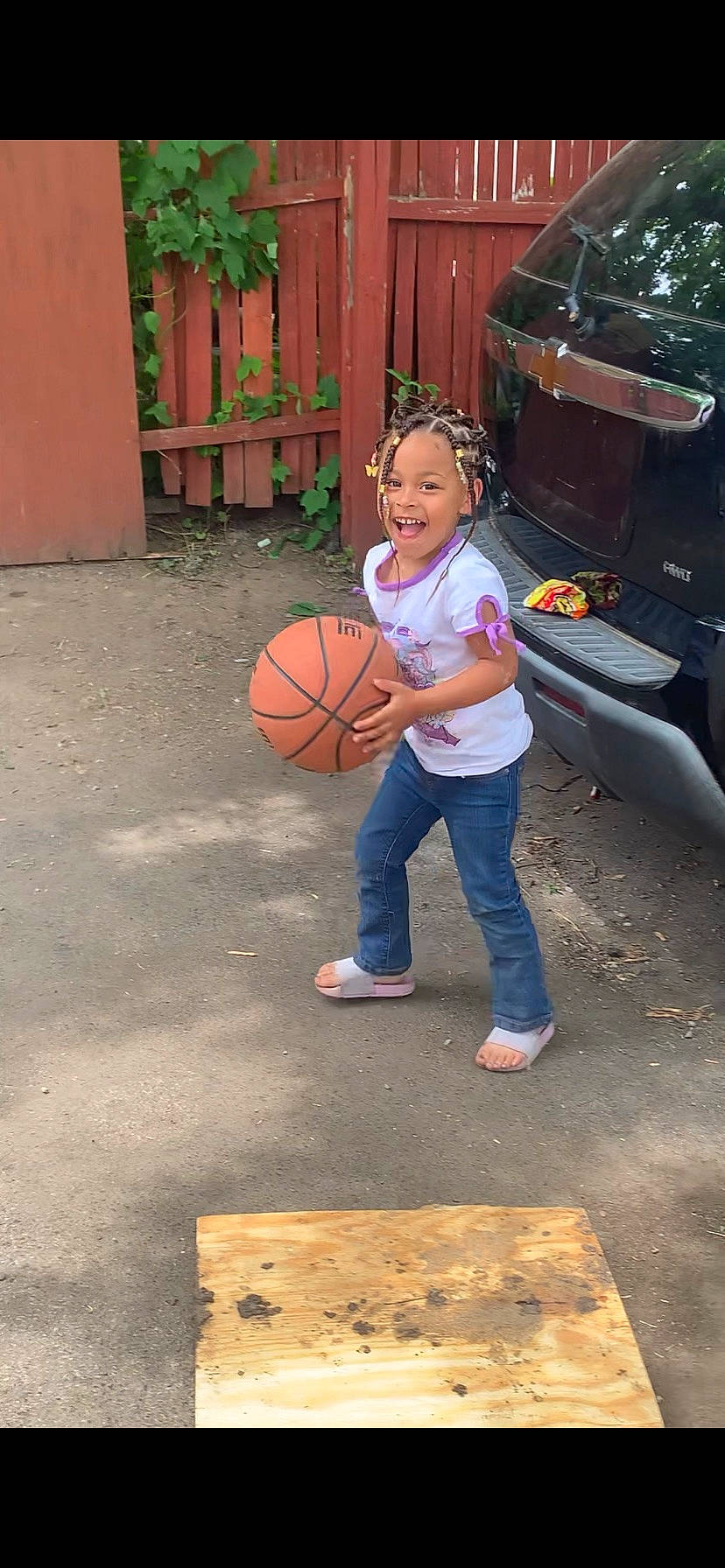 Gloriana is registered to the contest to win money with this photo: automotive_tire, ball, basketball, car, child, flooring, hat, headwear, leisure, person, plant, sports_equipment, sports_toy, streetball, tire, toddler, truck, vehicle, vehicle_door, wheel