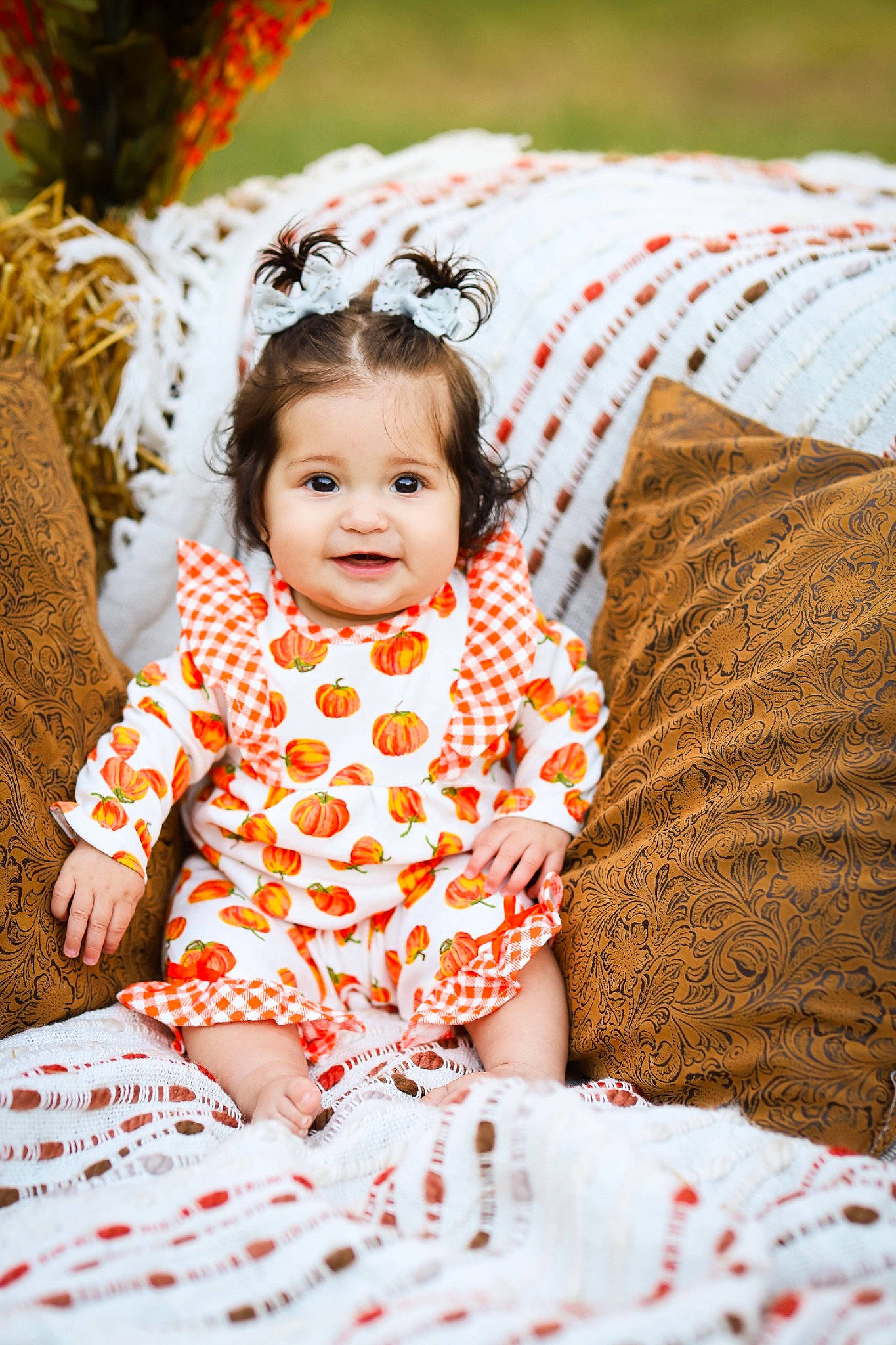 Anayeli joined the competition — help win amazing prizes! adaptation, baby, baby_toddler_clothing, child, dress, event, fun, grass, happy, linens, orange, pattern, people_in_nature, person, red, sitting, skin, smile, toddler, tree