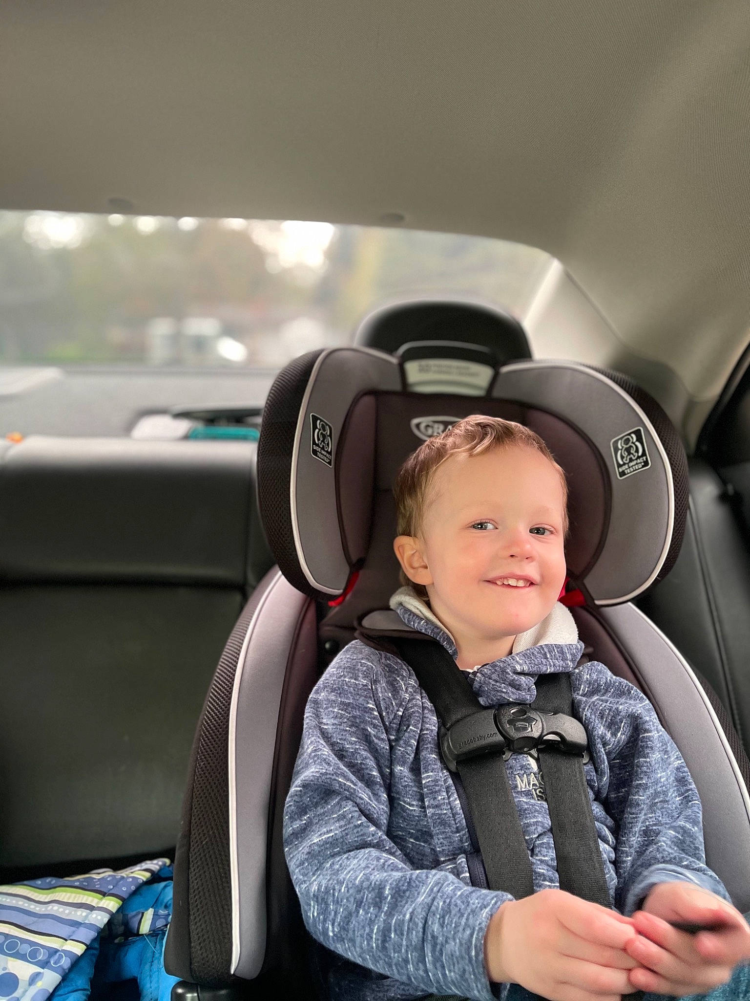 Heath joined the competition — help win amazing prizes! auto_part, automotive_design, automotive_exterior, car, car_seat, comfort, family_car, flash_photography, head_restraint, joy, mode_of_transport, motor_vehicle, person, personal_luxury_car, smile, steering_part, steering_wheel, technology, toddler, travel