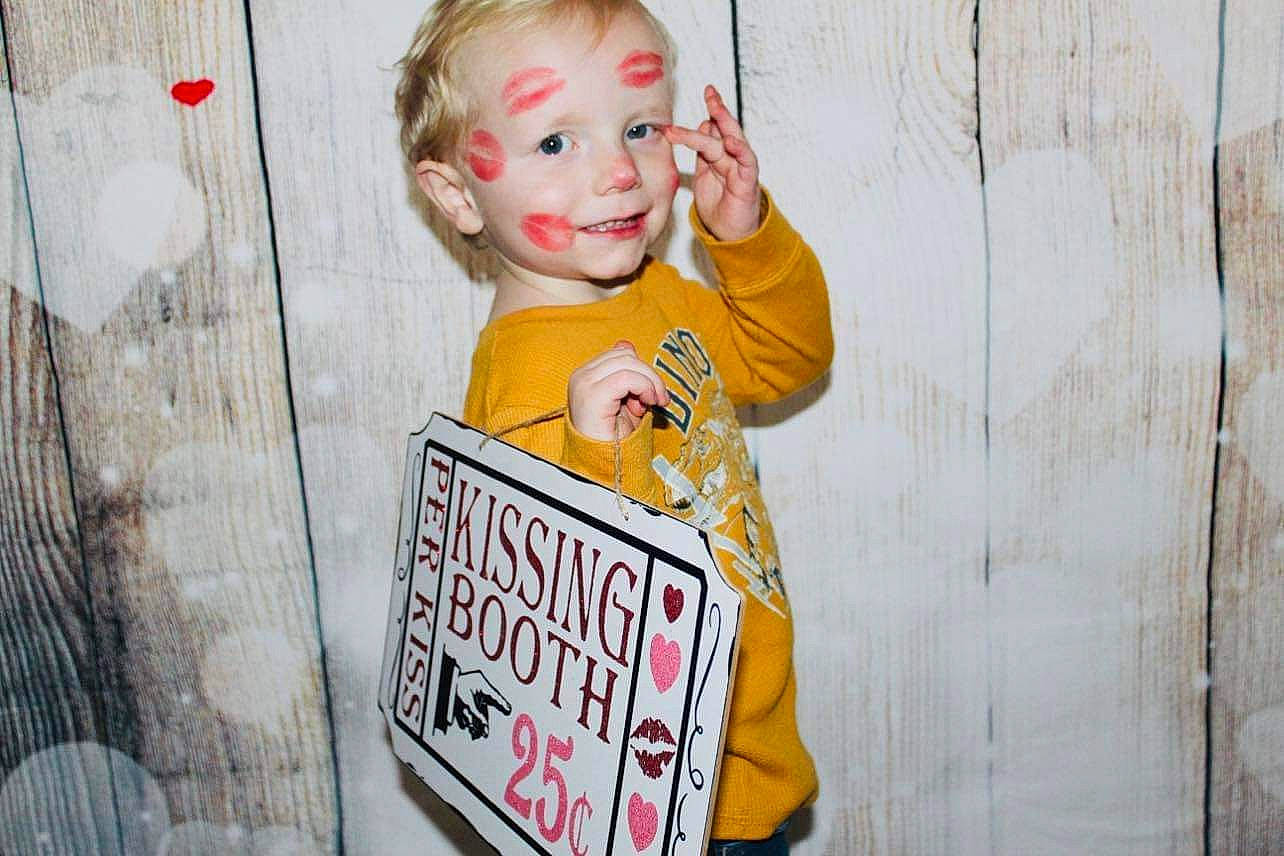Knox joined the competition — help win amazing prizes! baby_toddler_clothing, child, event, font, handwriting, happy, head, joy, person, public_event, sign, signage, sleeve, smile, t_shirt, toddler, wood