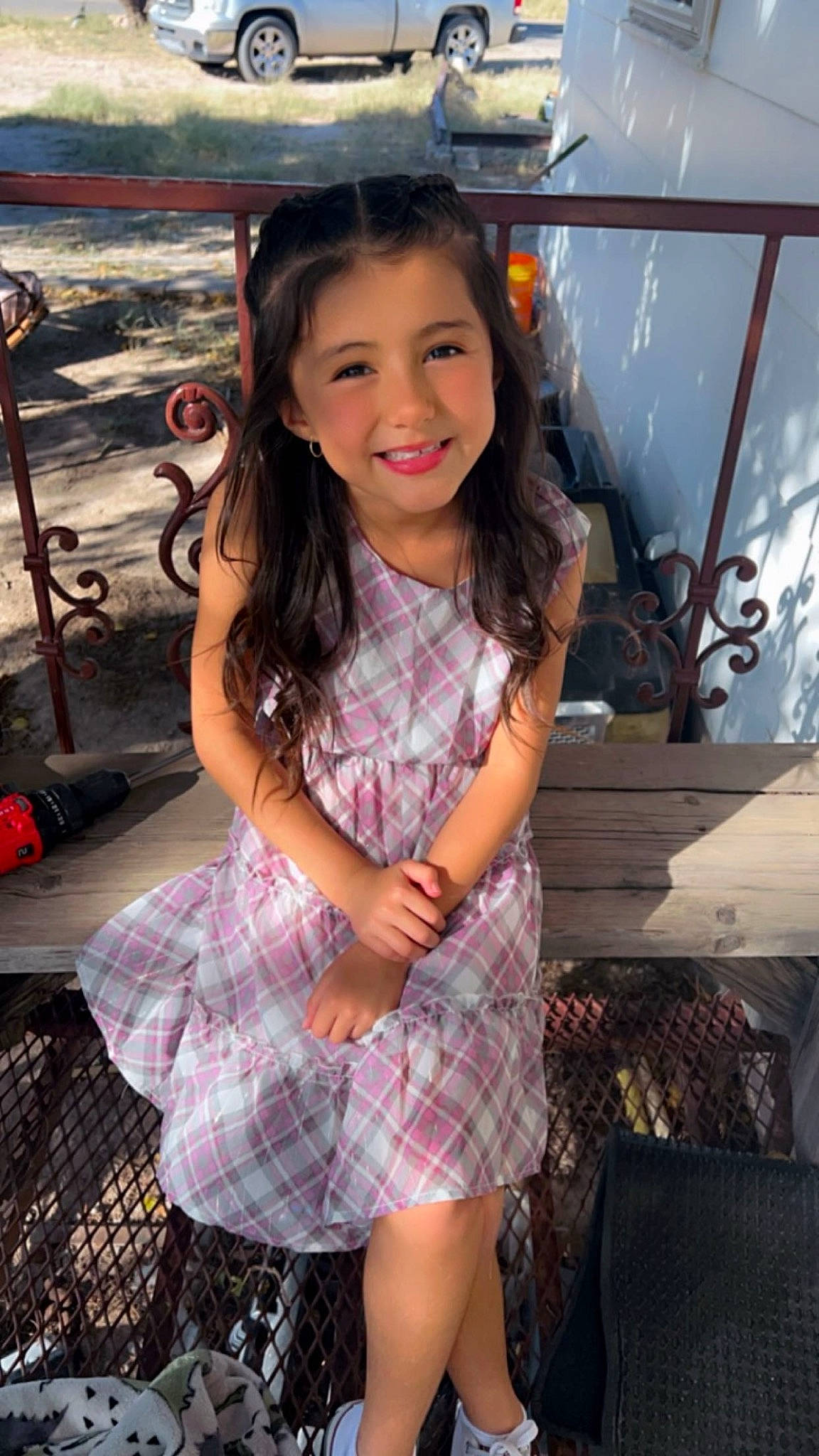 Jaelyn is registered to the contest to win money with this photo: child, dress, eye, fashion_design, flash_photography, fun, hairstyle, happy, human_leg, joy, long_hair, pattern, person, pink, plaid, skin, smile, tartan, thigh, travel