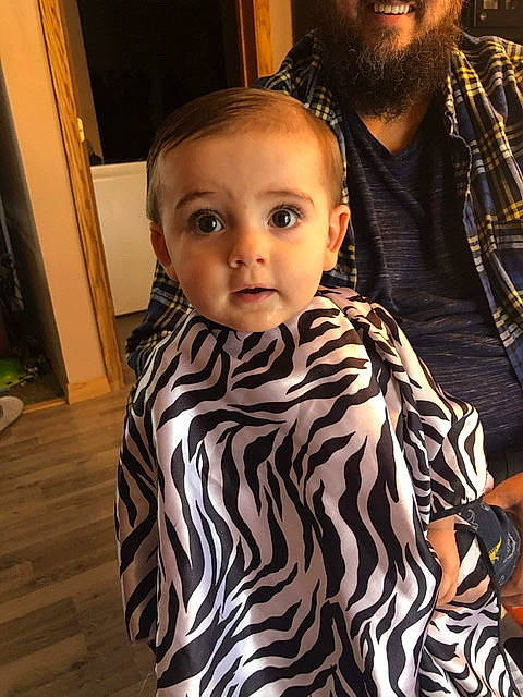 Josh is registered to the contest to win money with this photo: cheek, child, cool, hair, hairstyle, head, long_hair, outerwear, person, surprise, toddler