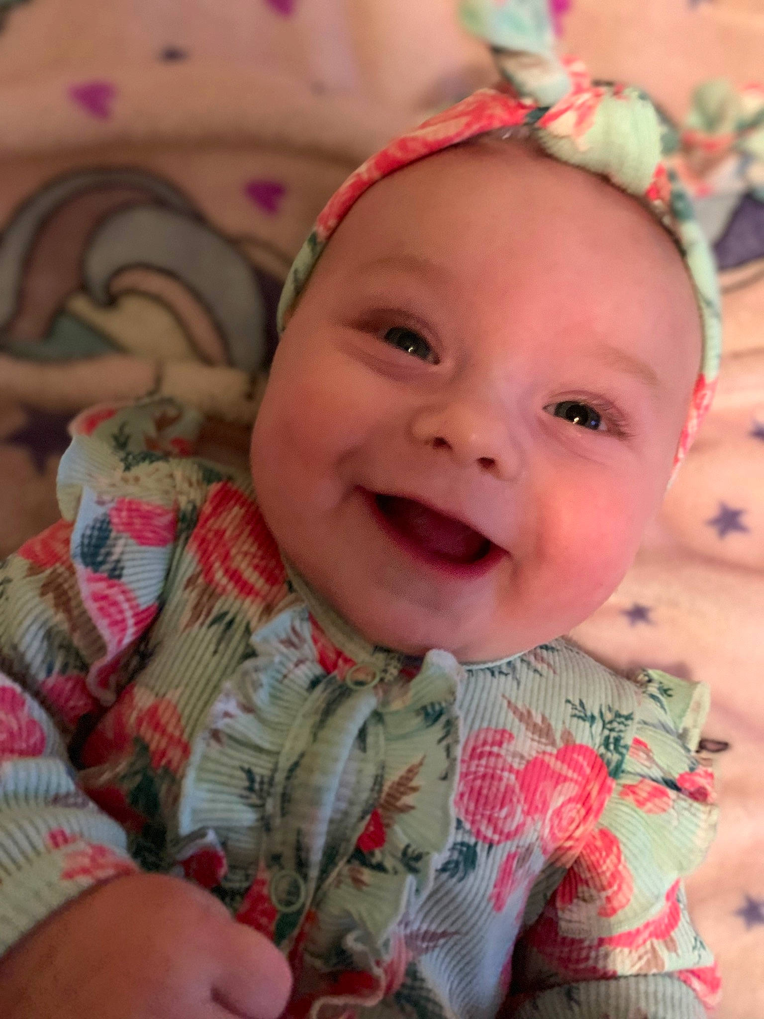 Annalynn is registered to the contest to win money with this photo: baby, baby_toddler_clothing, cheek, chin, eye, eyebrow, face, finger, forehead, happy, head, human_body, iris, joy, lip, mouth, nose, person, pink, skin