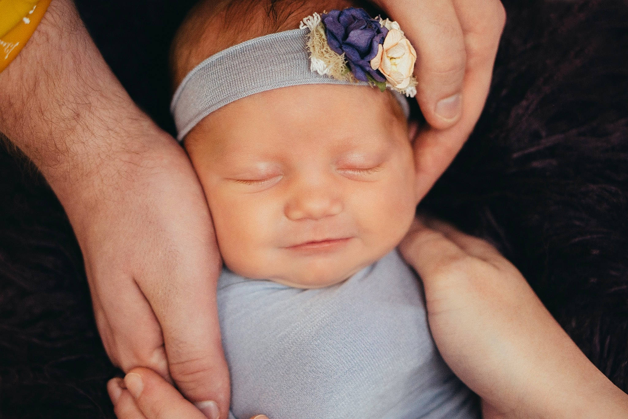 Oaklyn is registered to the contest to win money with this photo: arm, baby, cheek, child, face, fashion_accessory, finger, forehead, fun, hair_accessory, hand, head, headband, headgear, headpiece, headwear, muscle, nail, person, photography