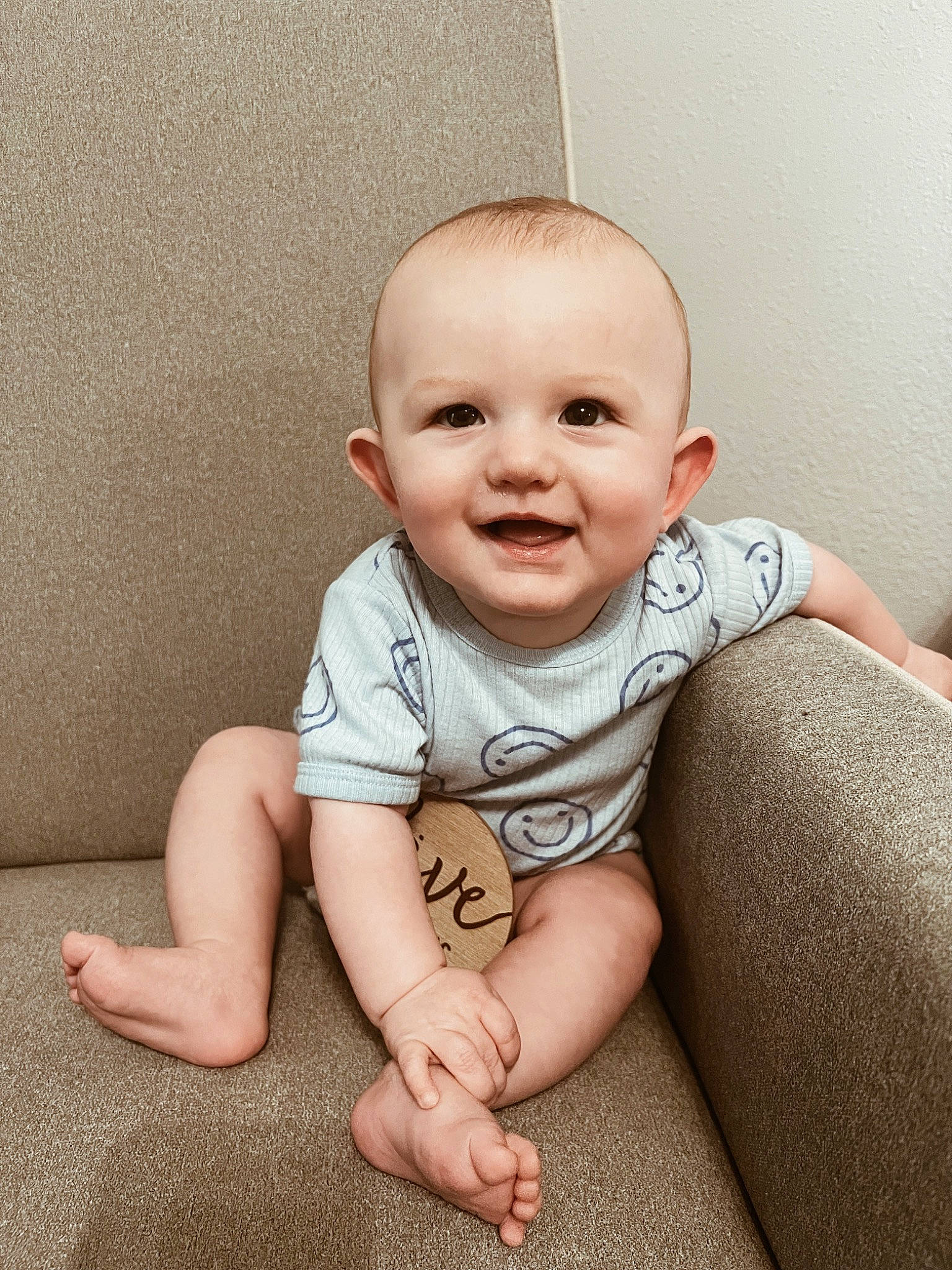 Cohen joined the competition — help win amazing prizes! baby, baby_toddler_clothing, cheek, child, collar, comfort, eye, flash_photography, floor, flooring, grey, happy, human_leg, iris, joy, person, sitting, skin, sleeve, smile
