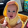baby, child, costume, yellow, duck, basket, indoor, smiling, happy, cute, clothing, face, person, infant, seat, furniture, expression, pampers, home, floor