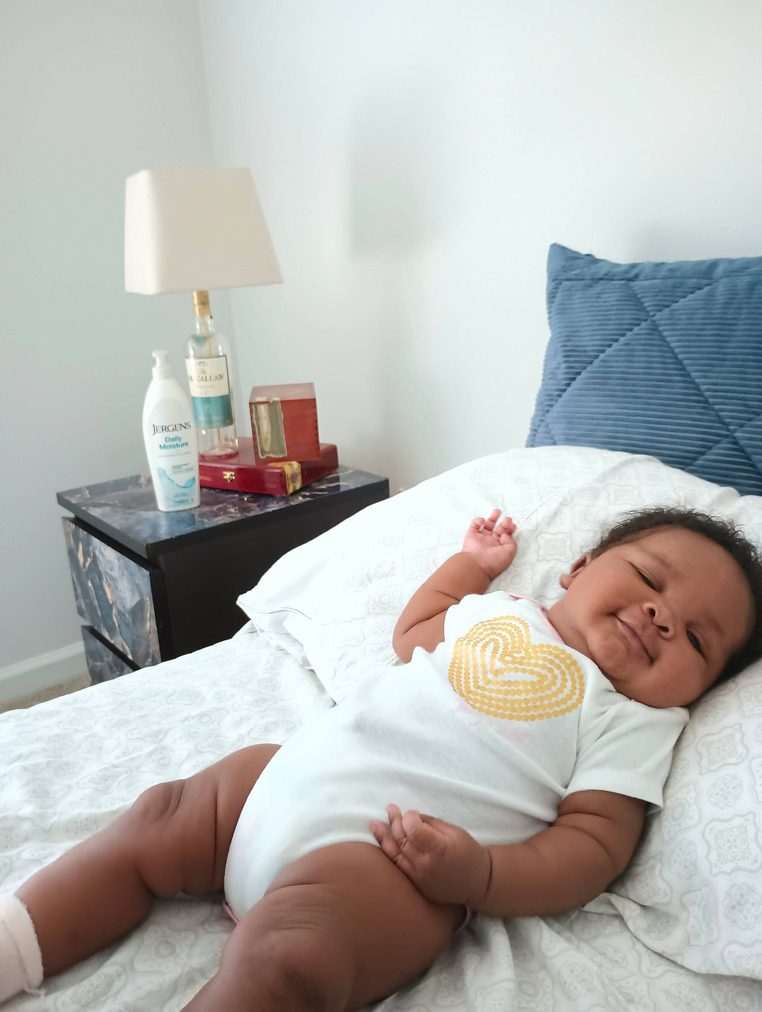 Damari is registered to the contest to win money with this photo: abdomen, baby, baby_safety, baby_sleeping, baby_toddler_clothing, comfort, diaper, glasses, hat, human_leg, joint, knee, leg, linens, person, room, skin, thigh, thumb, toddler