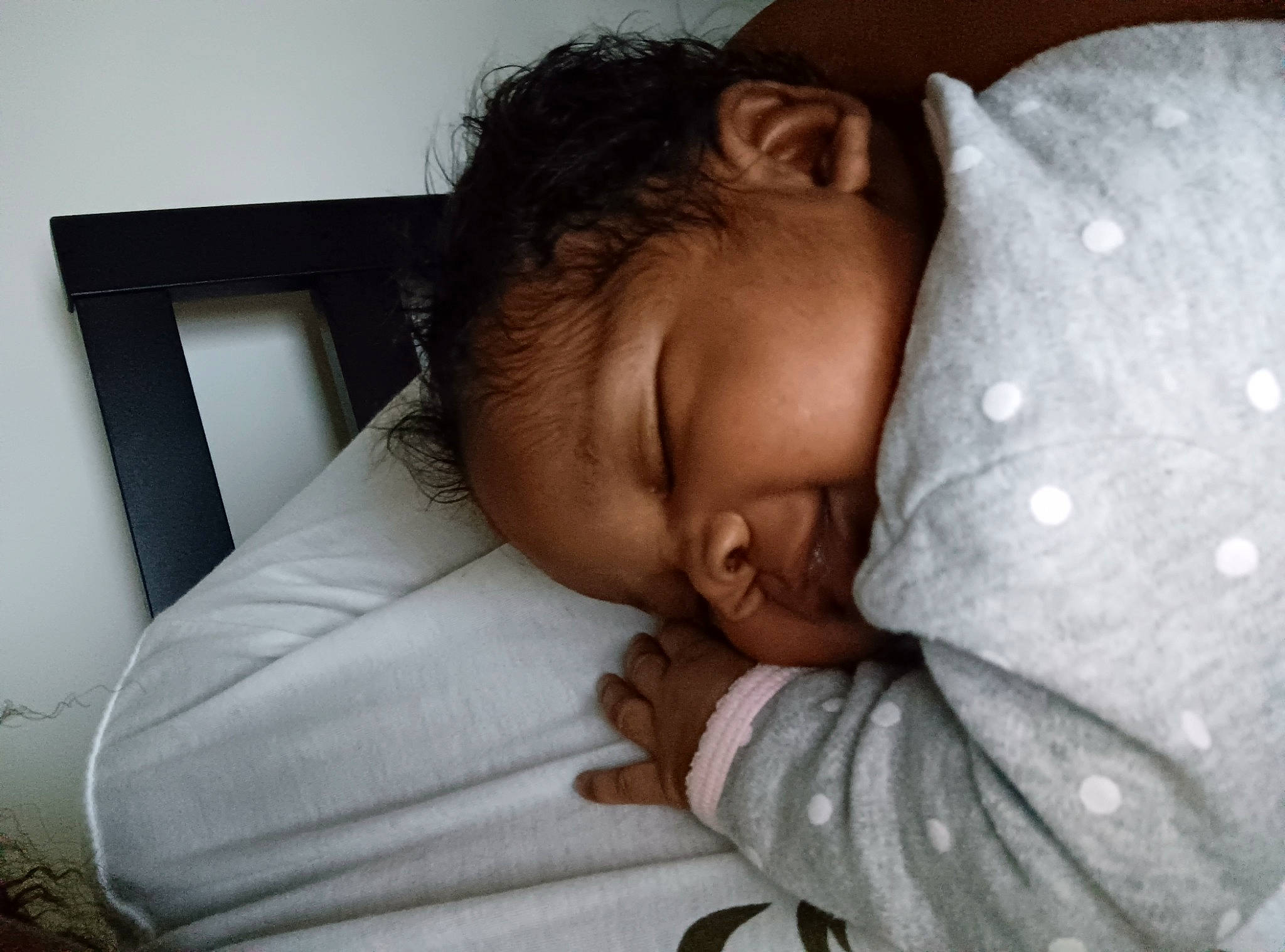 Damari is registered to the contest to win money with this photo: baby, baby_sleeping, baby_toddler_clothing, bedding, bedtime, cheek, child, comfort, gesture, happy, linens, nap, nose, person, room, skin, sleep, sleeve, smile, thumb